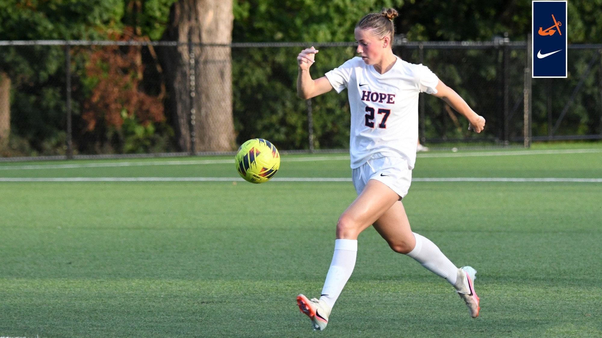 Halle Barnard sprints up the soccer field with possession vs. Illinois Tech