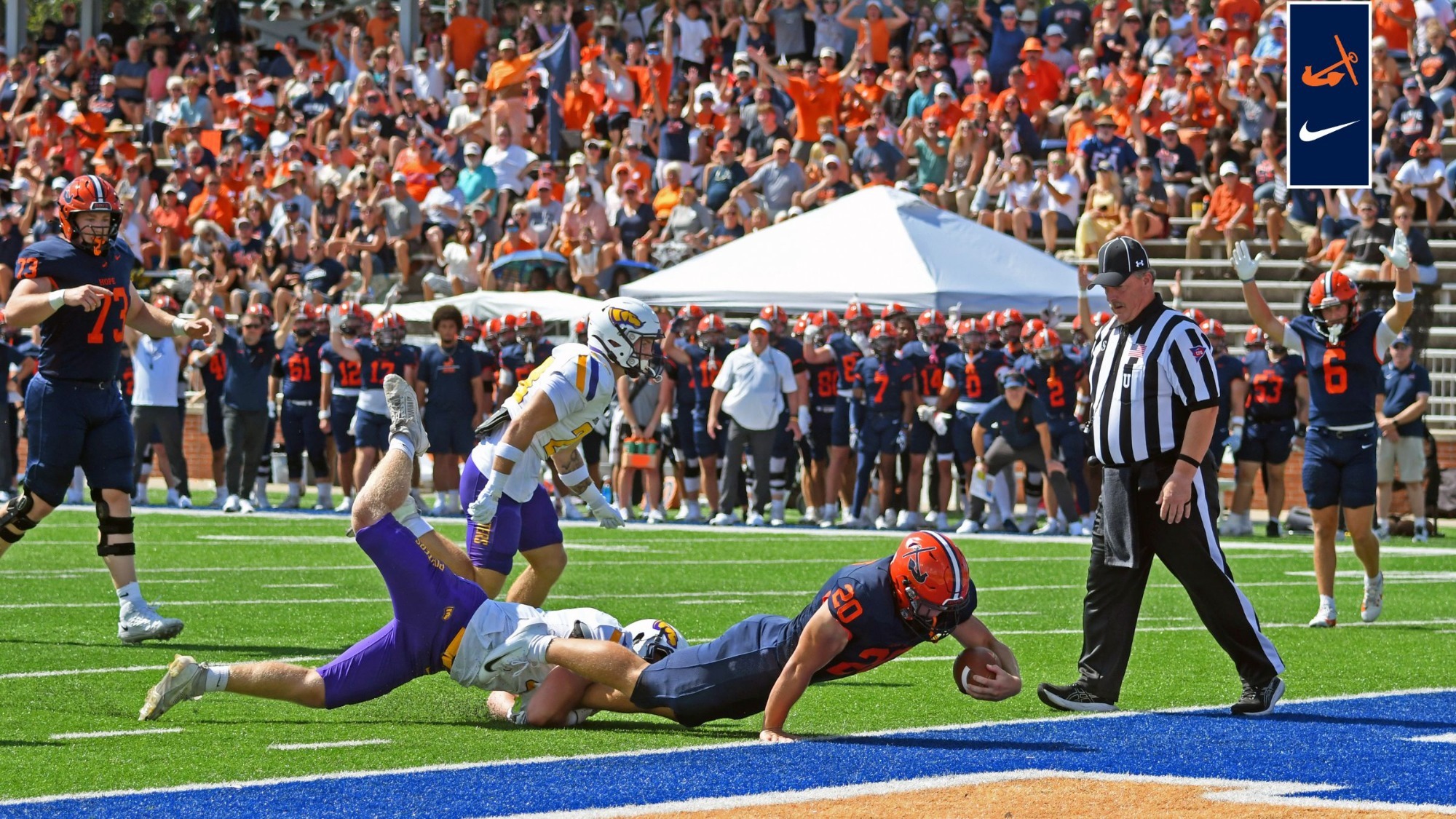 Runing back Brody Schuiteman lunges toward the end zone.