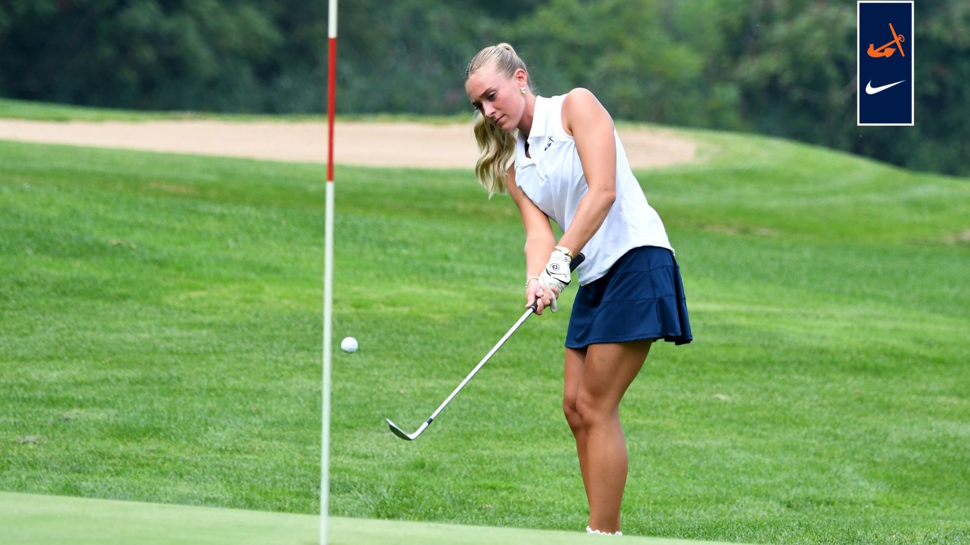 Kylie Gernaat chips onto the green vs. Calvin