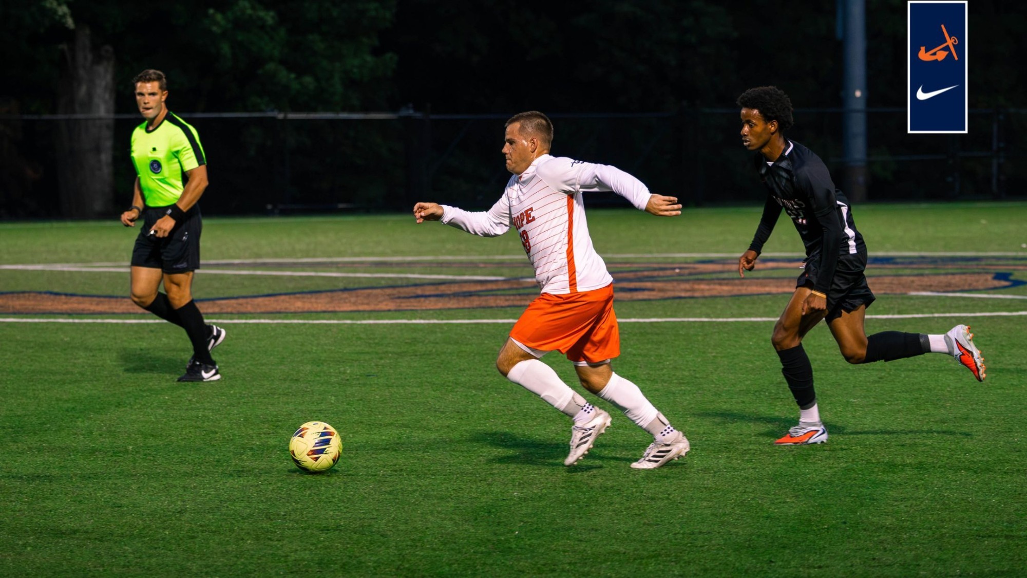 Evan Tsandes charges up field with possession vs. Lake Michigan College.