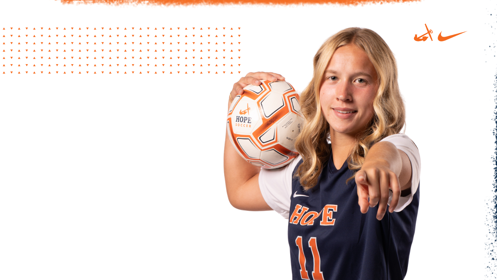 Avery Plummer holds a soccer ball on her shoulder.
