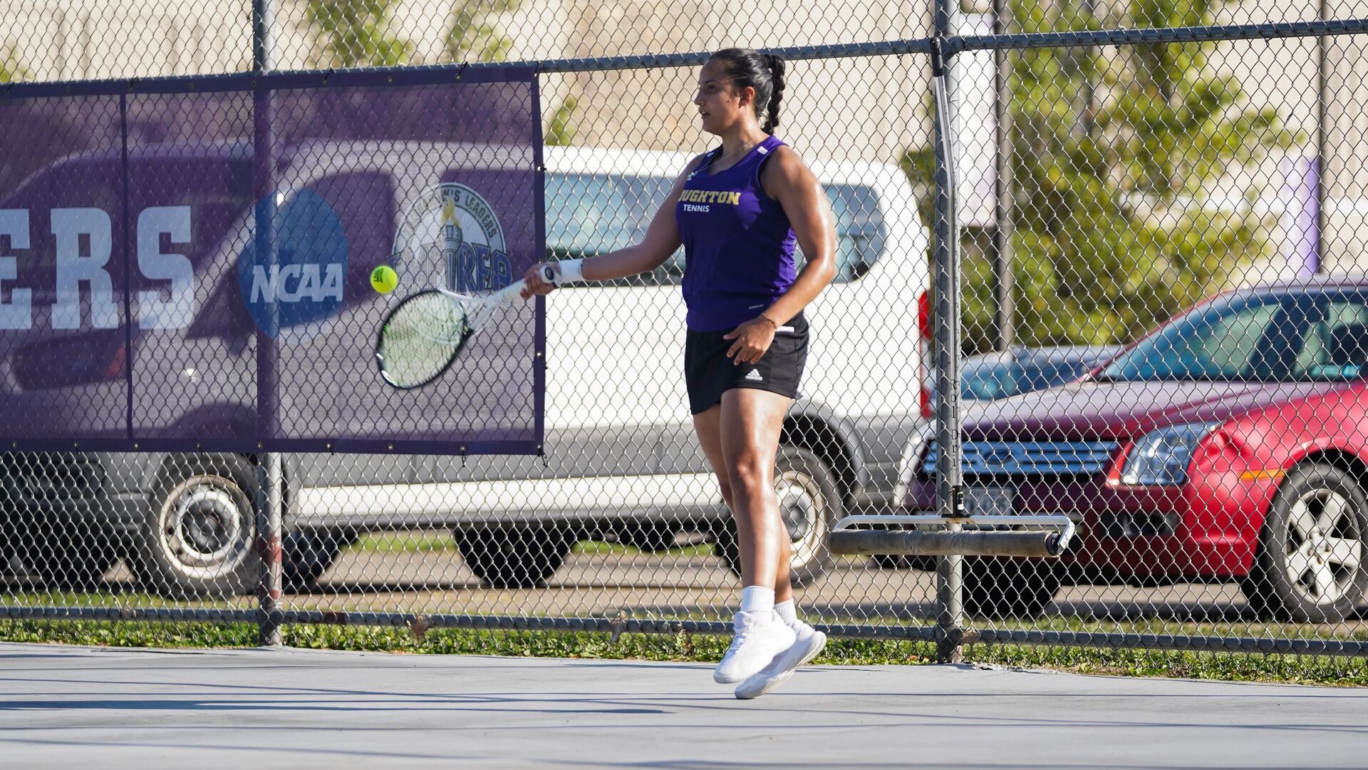 Victoria Martinez returns a shot