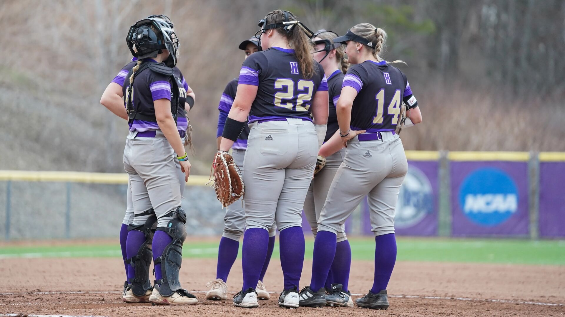 Softball mound huddle