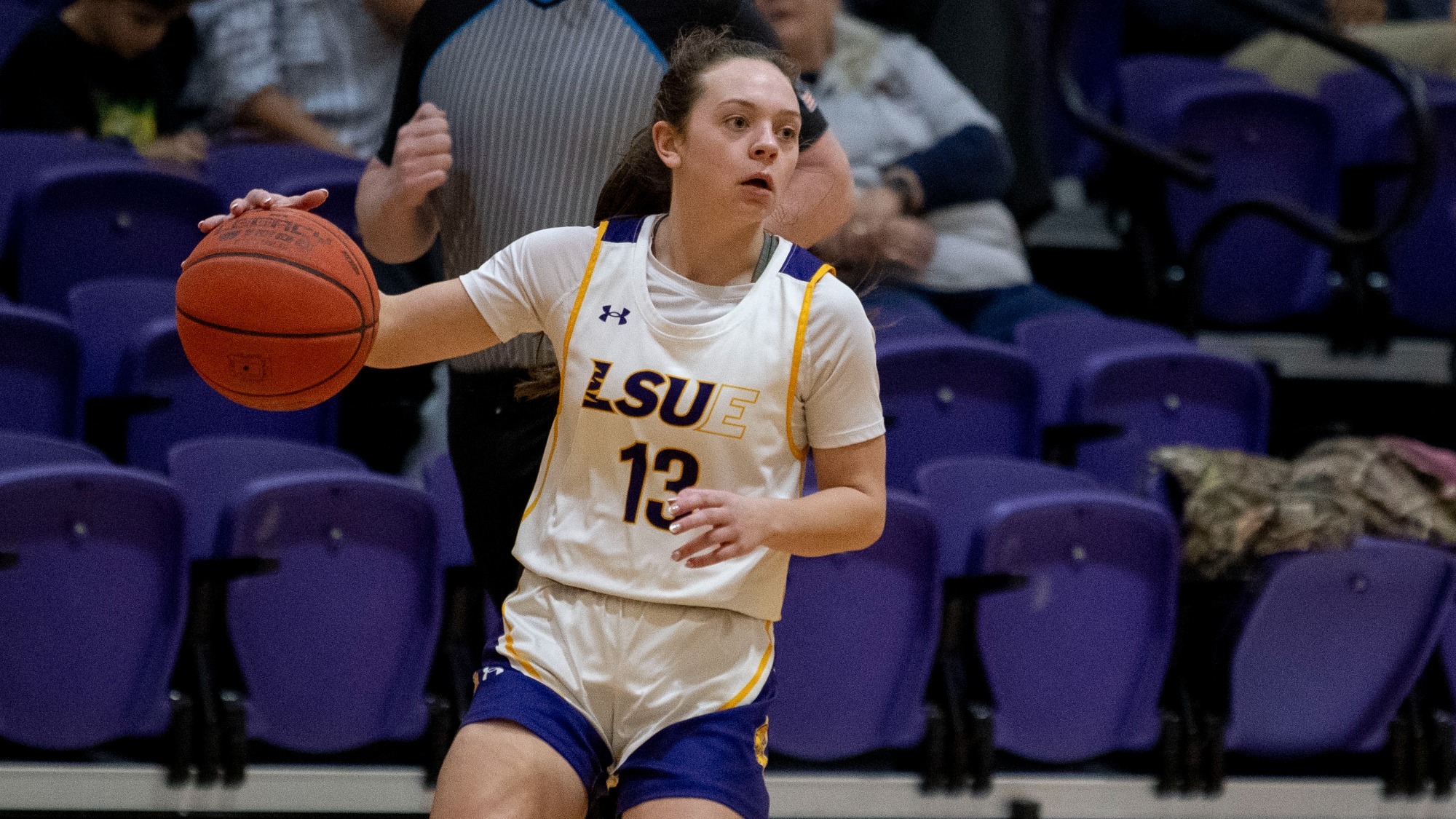 Bella Henry dribbles into the half court against SW Mississippi
