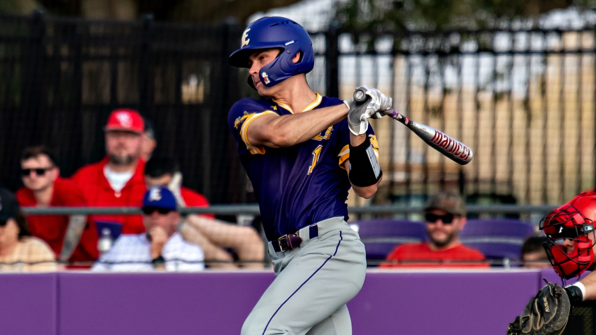 Aidan Mouton connects on a base hit during action against Wharton County.