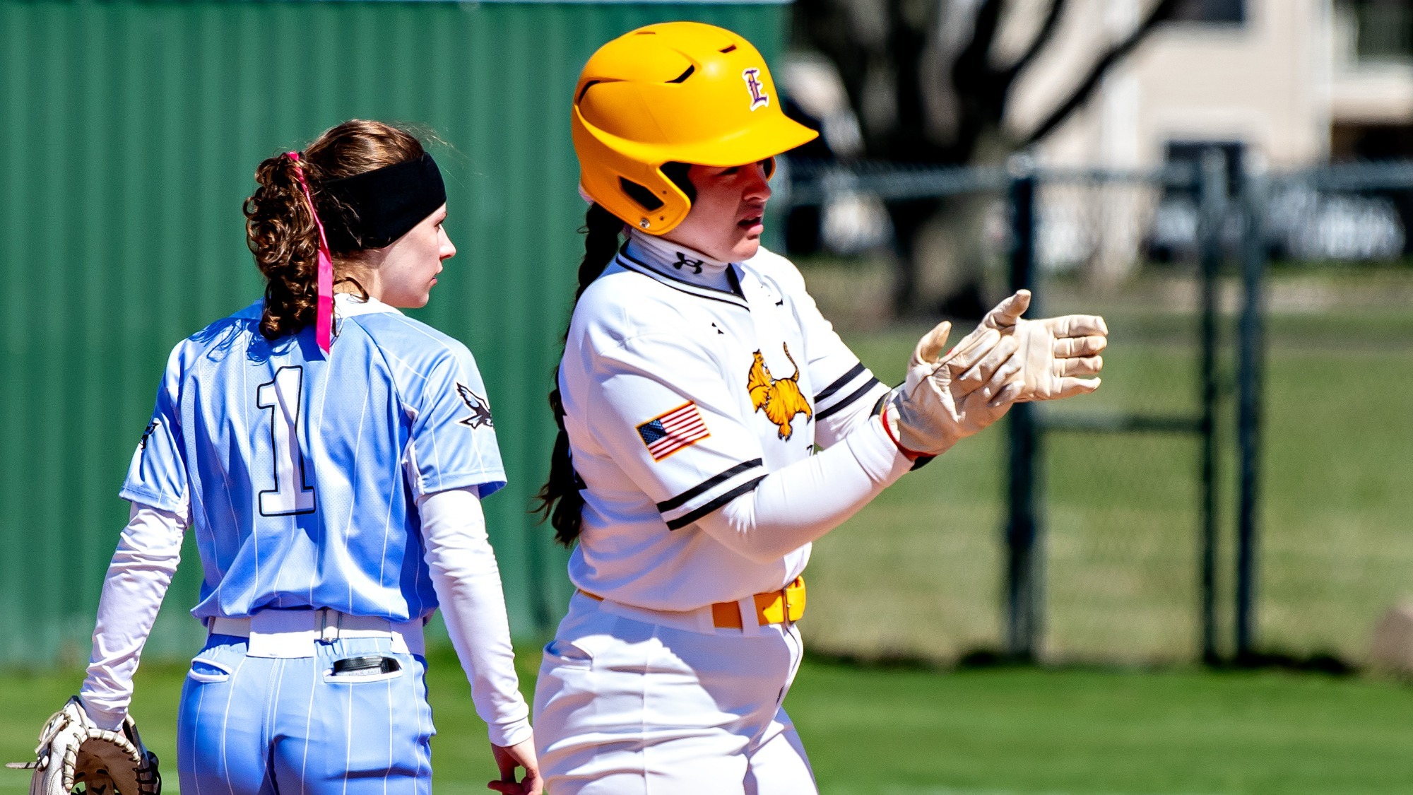 Jadyn Yesso encourages the dugout after reaching second base.