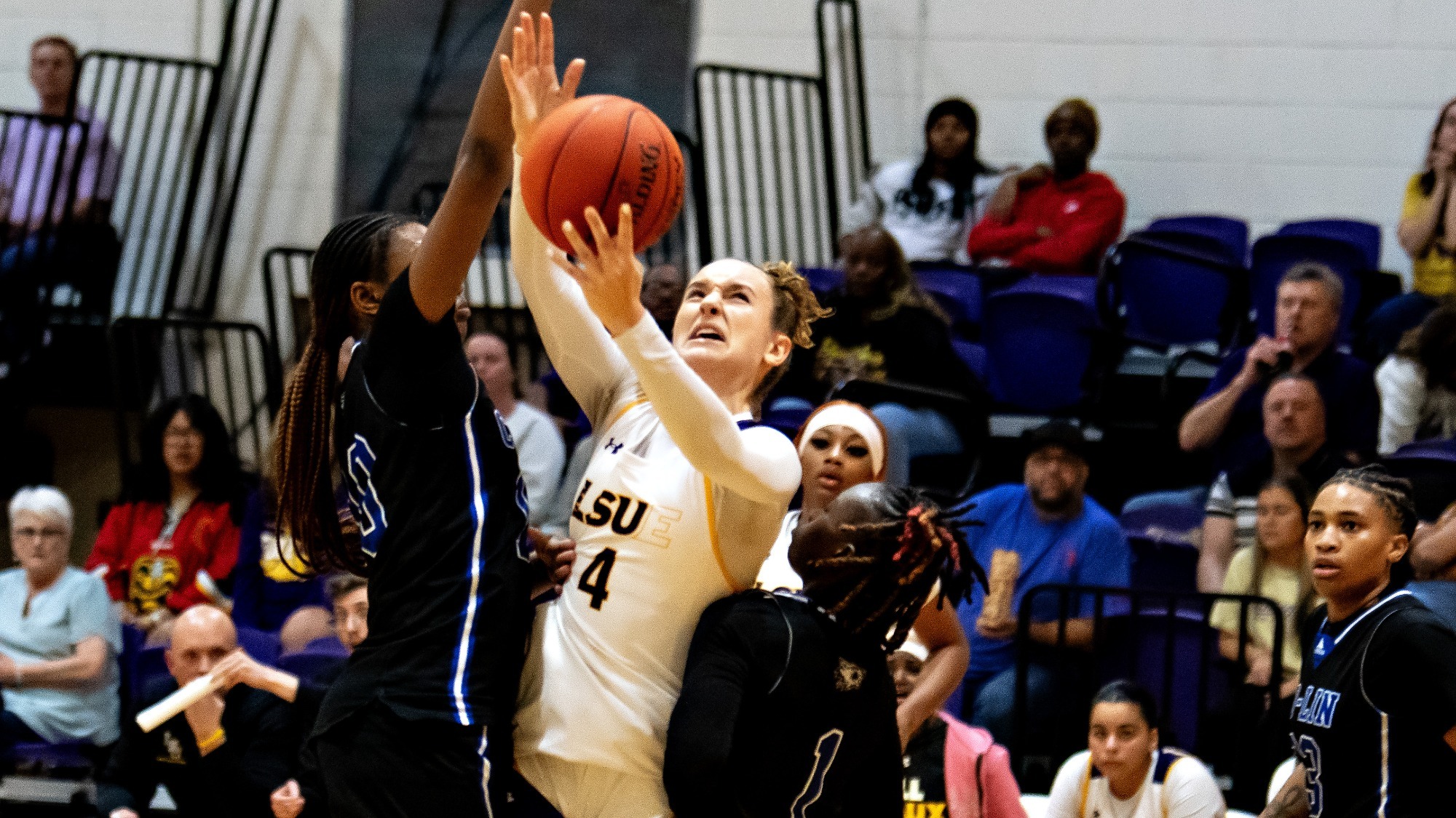 Paulina Reichenauer fights through the Copiah-Lincoln defense for a basket.