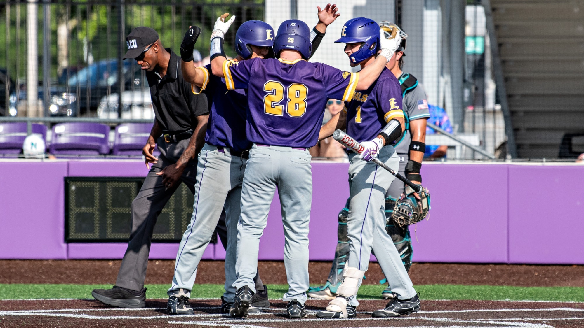 Andrew Clapinski is met by teammates after hitting a home run vs. Nunez.