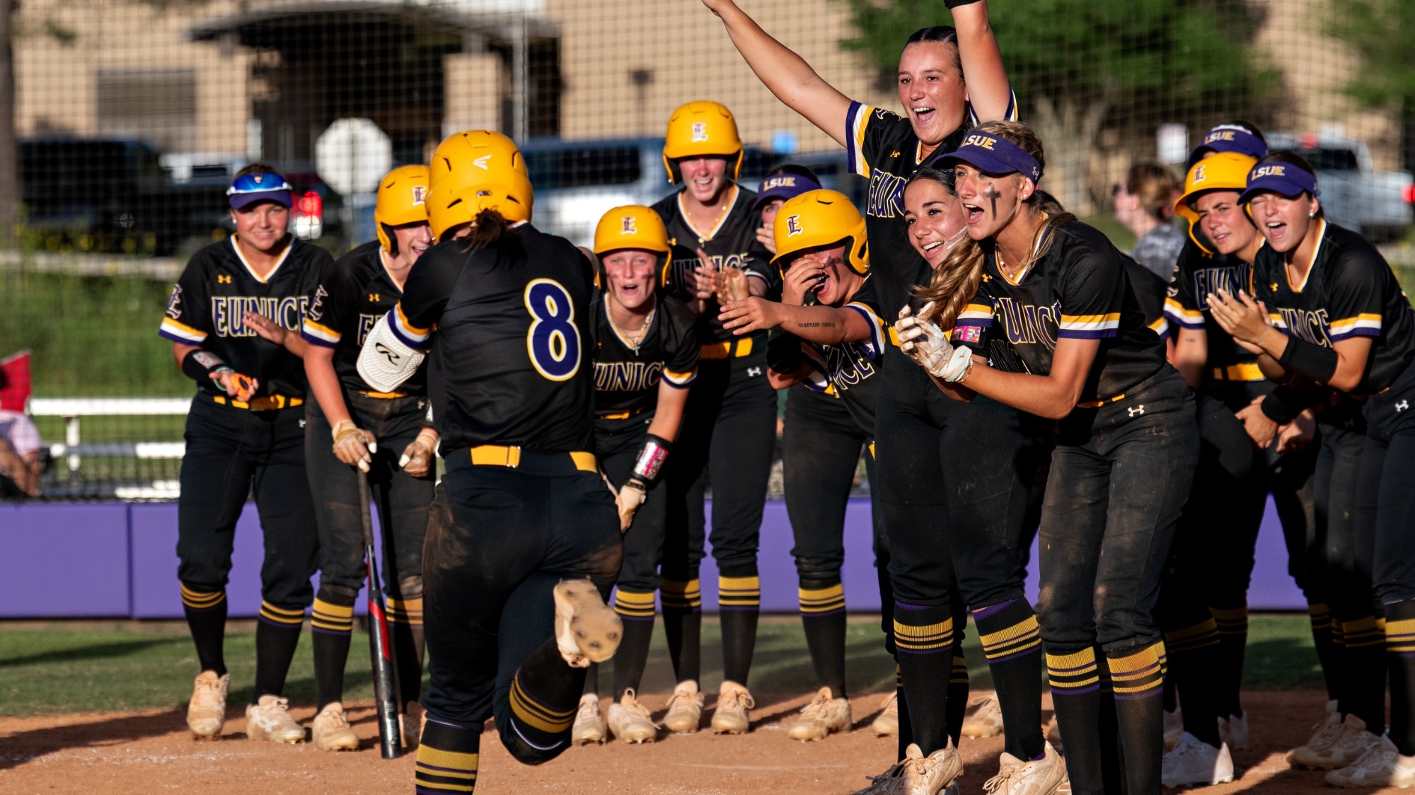 Jordan Stanley is met by her teammates after hitting a home run vs. Baton Rouge.
