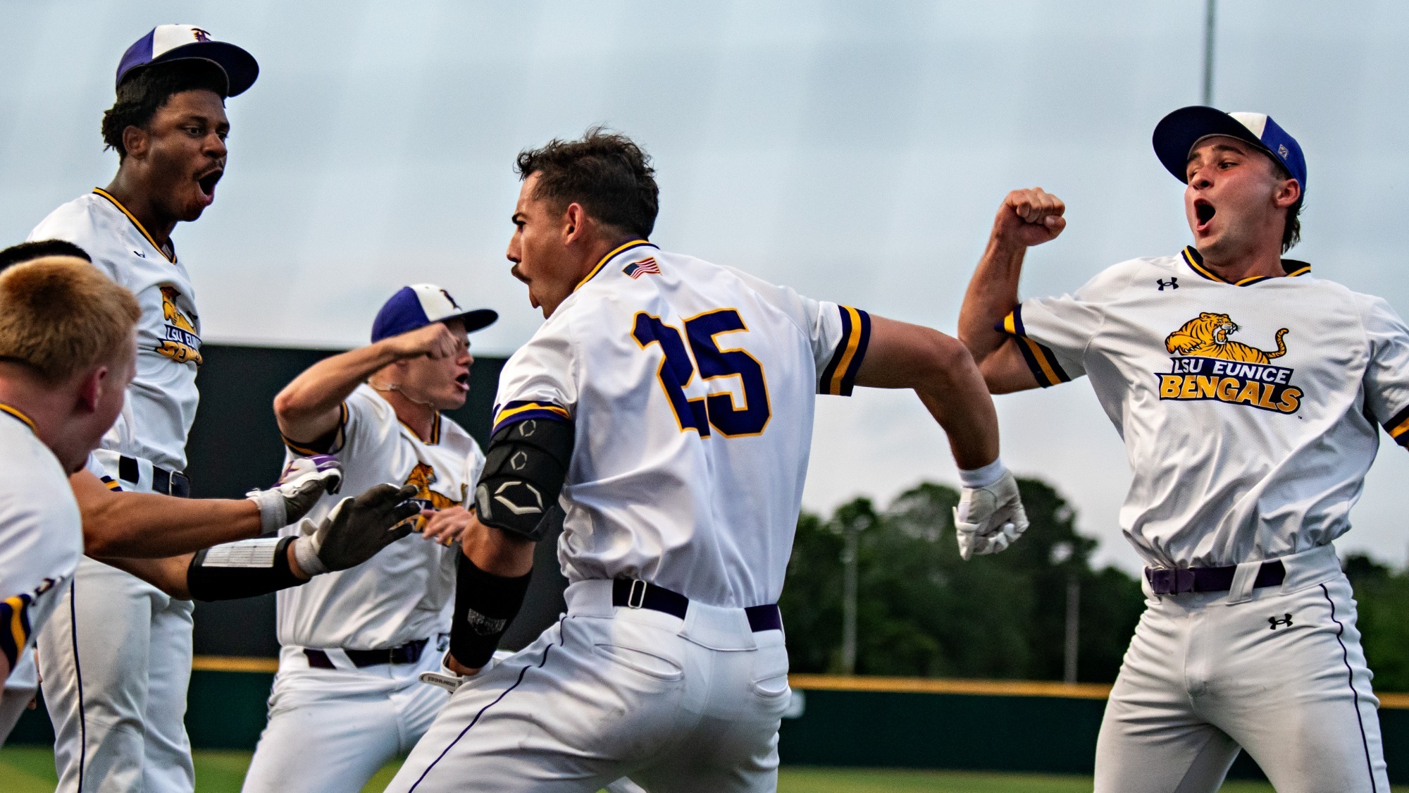 Mason Bordelon celebrates with teammates after a home run vs. Delgado.
