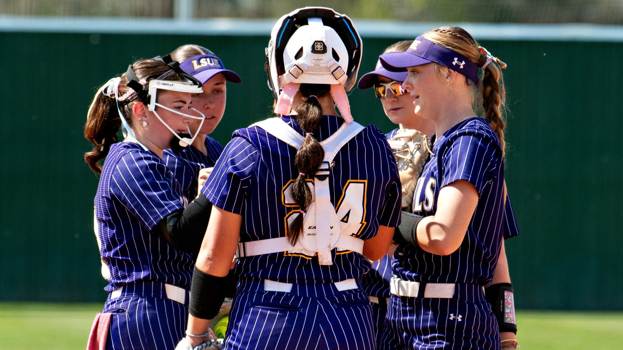 Group huddle for LSU Eunice softball during a game this season.