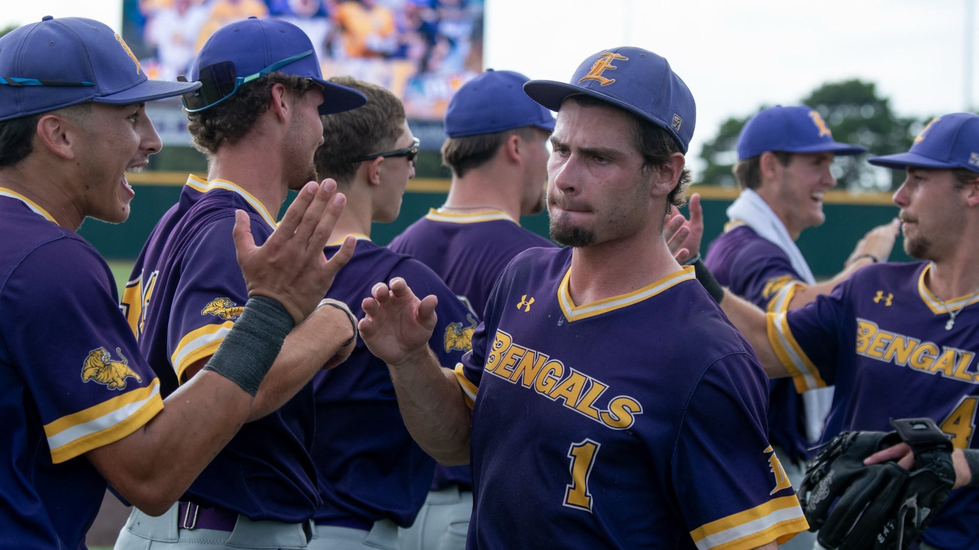 Aidan Mouton celebrates with Tyler Mitchell after clinching the South District Series.