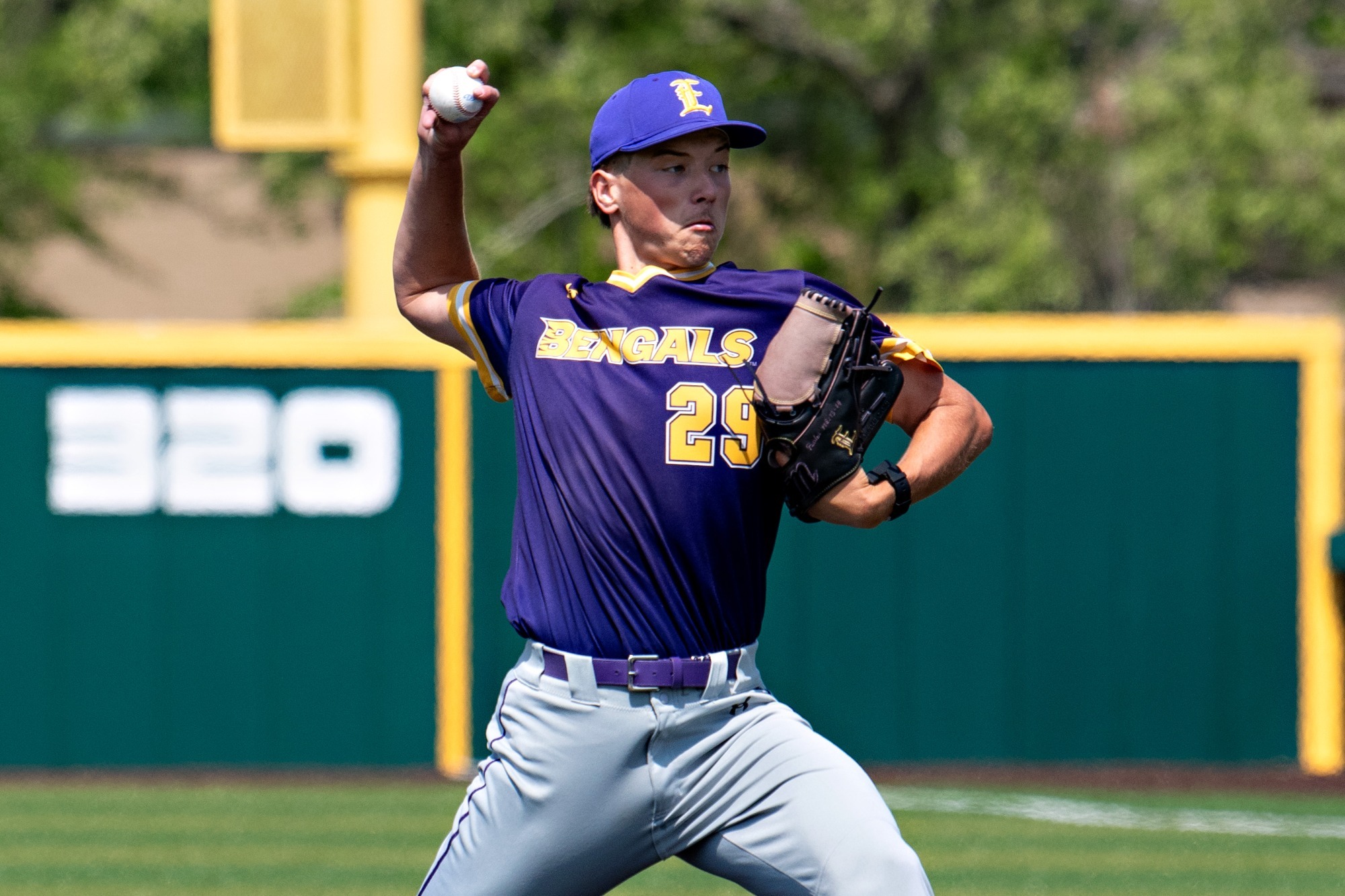 Lane Fenske makes a pitch during action at Bengal Stadium.
