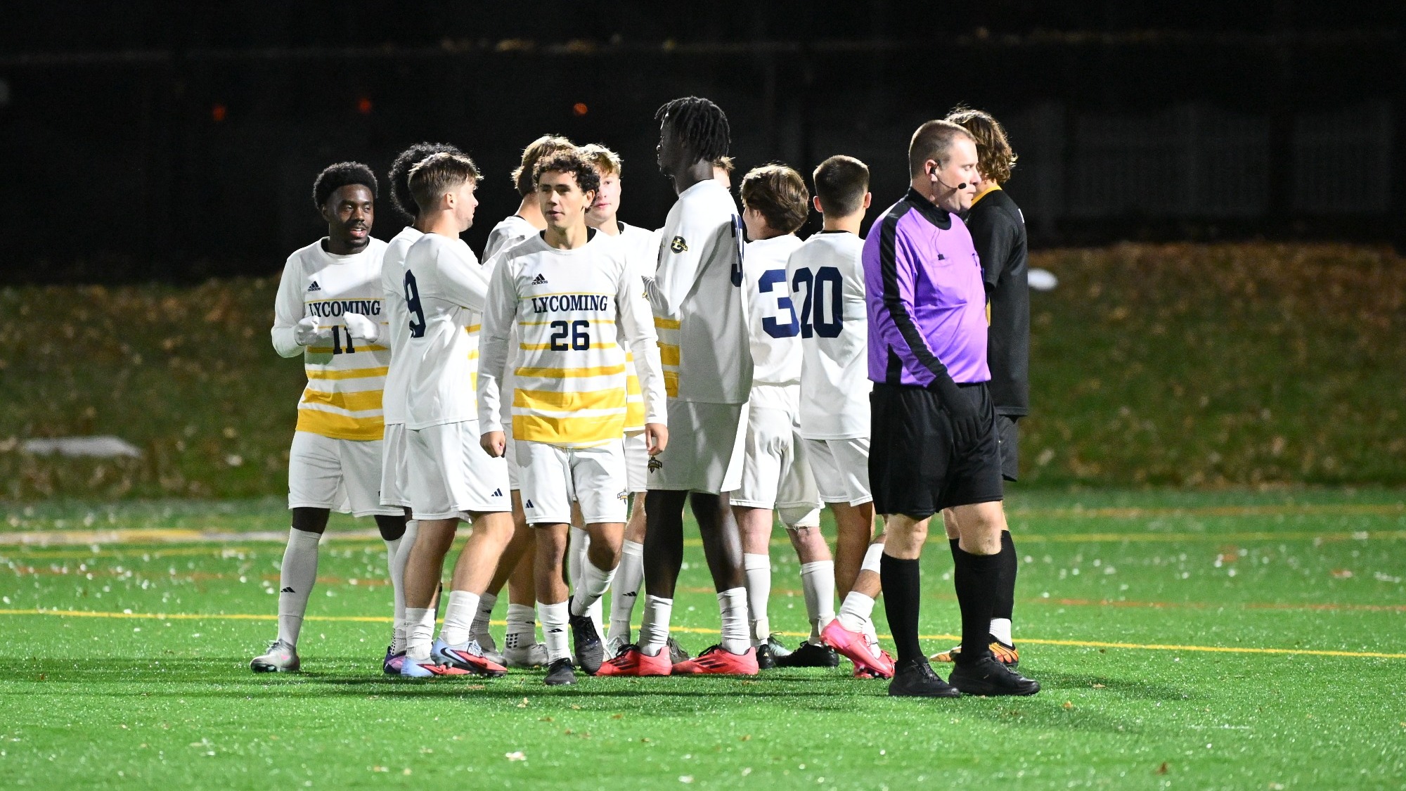 Men's soccer huddle