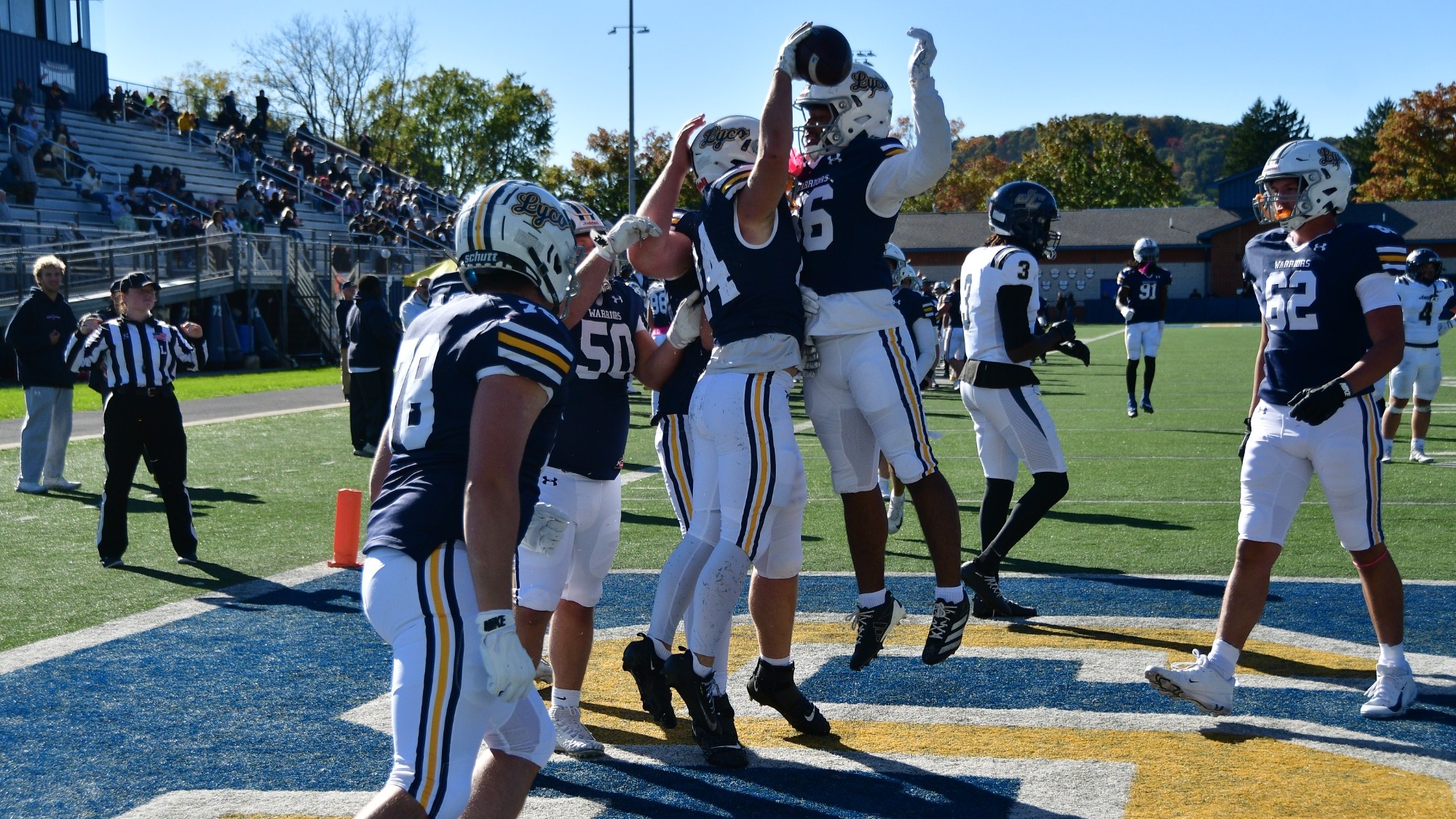 Warriors celebrate a touchdown