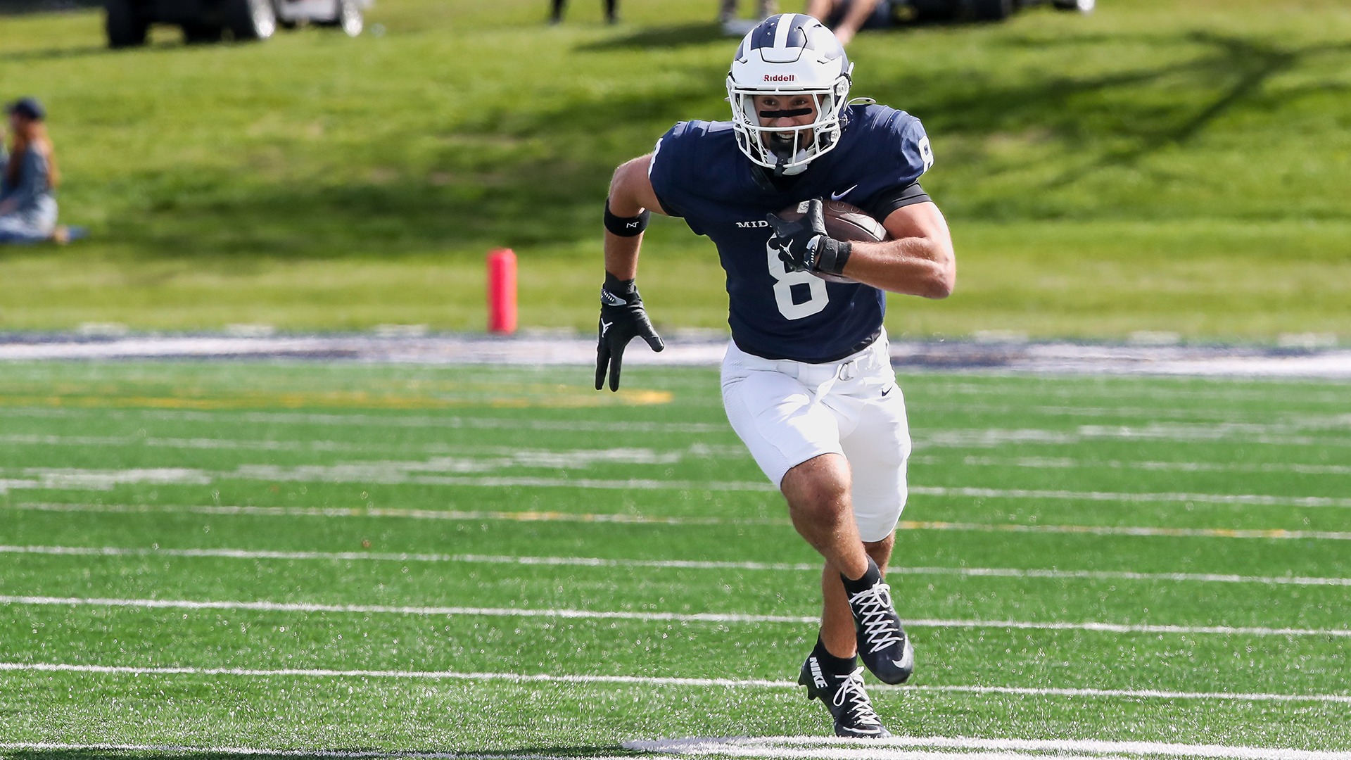 Jordan Angstreich heads up the field during a game against Wesleyan.
