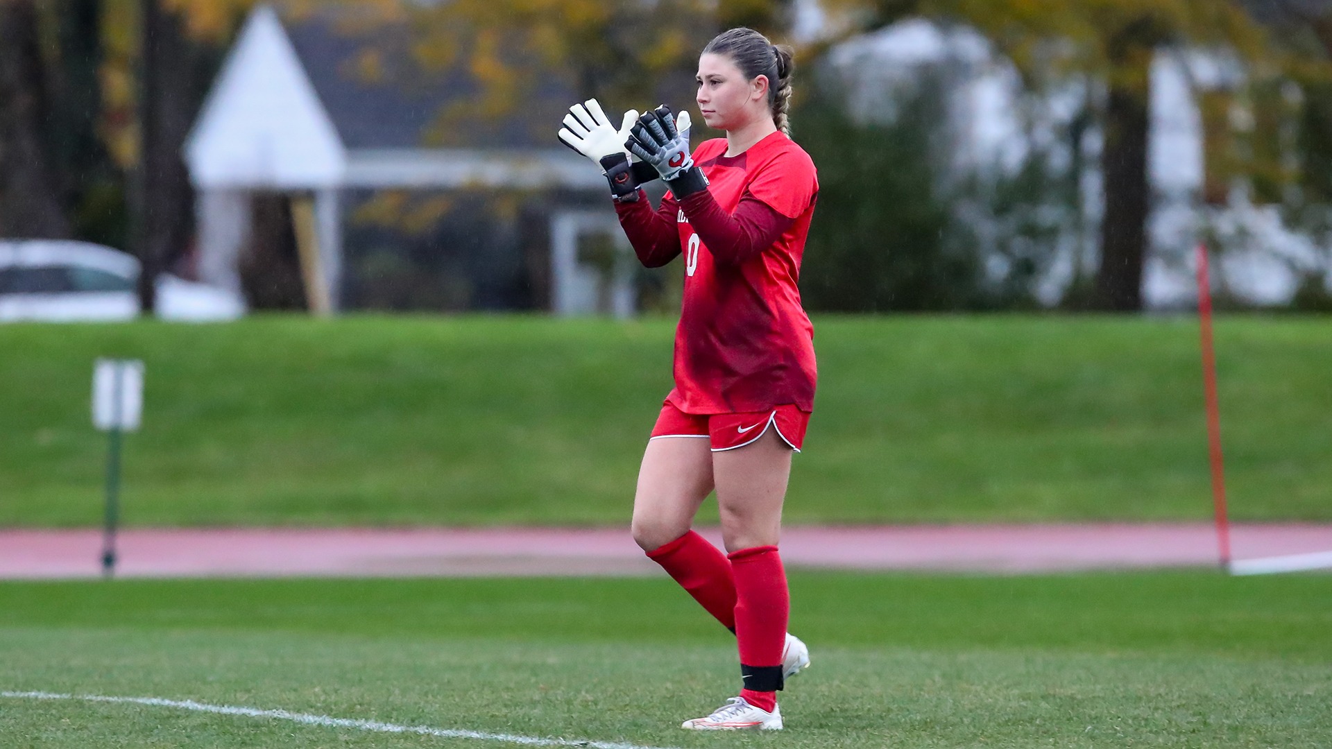 Aubrey Silvestri claps her goalie gloves together during Middlebury's match against the University of Southern Maine.