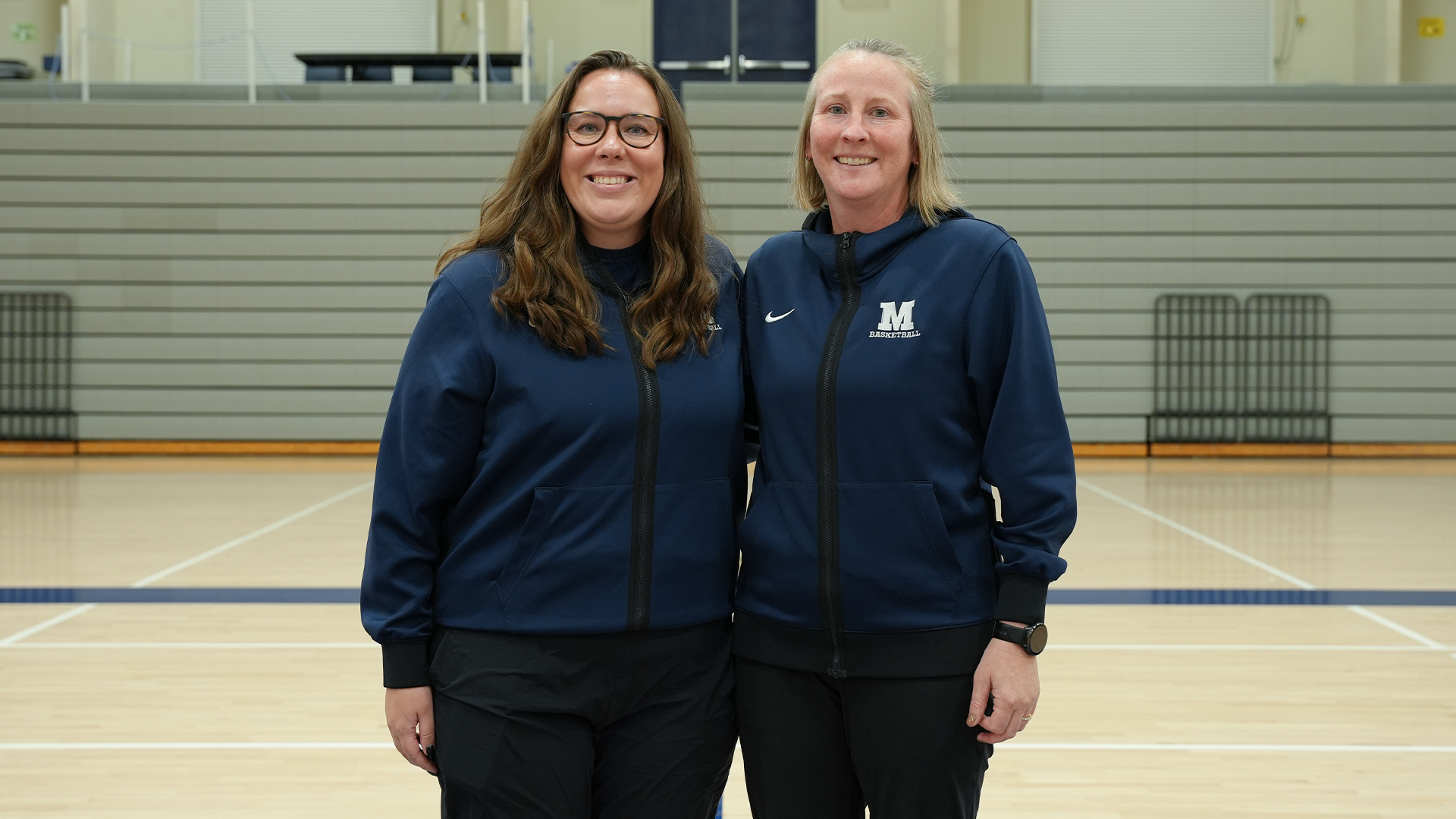 The 2026-27 Middlebury women's basketball coaching staff.