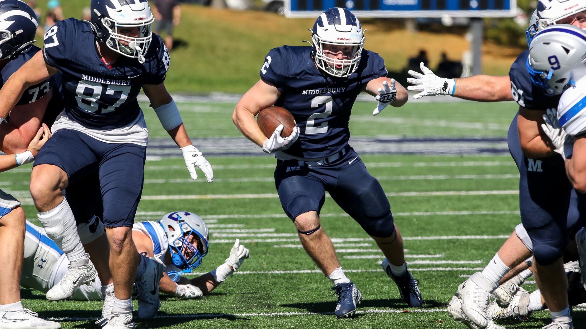 Connor McClellan hits the gap during Middlebury's home triumph against Colby.