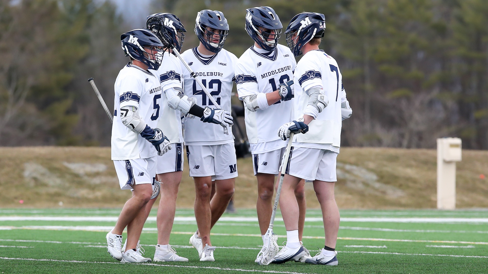 MLAXOffenseHuddle26Tufts_26