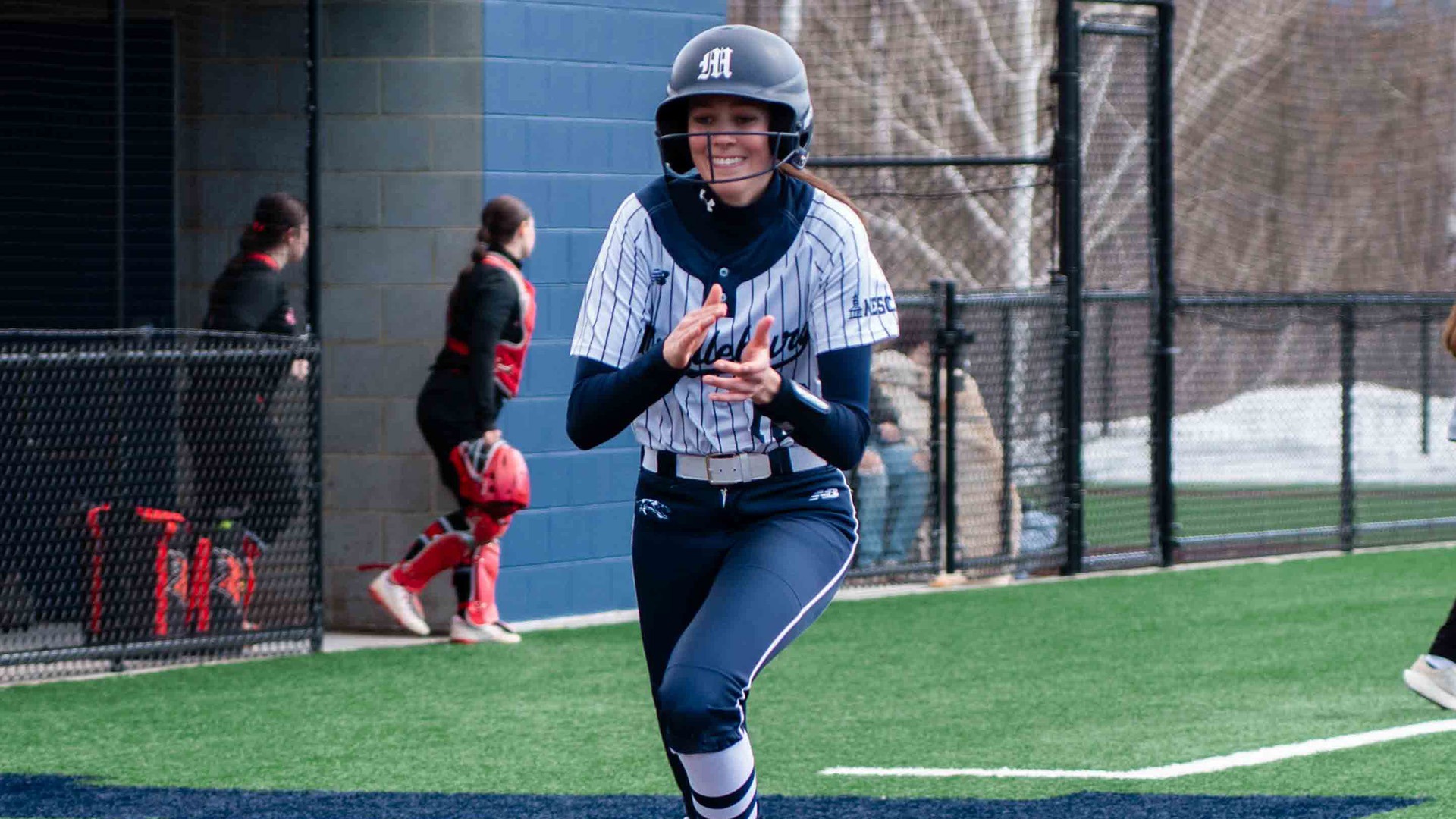 Olivia Scholes scores a run during a contest against Plattsburgh during the 2026 season.