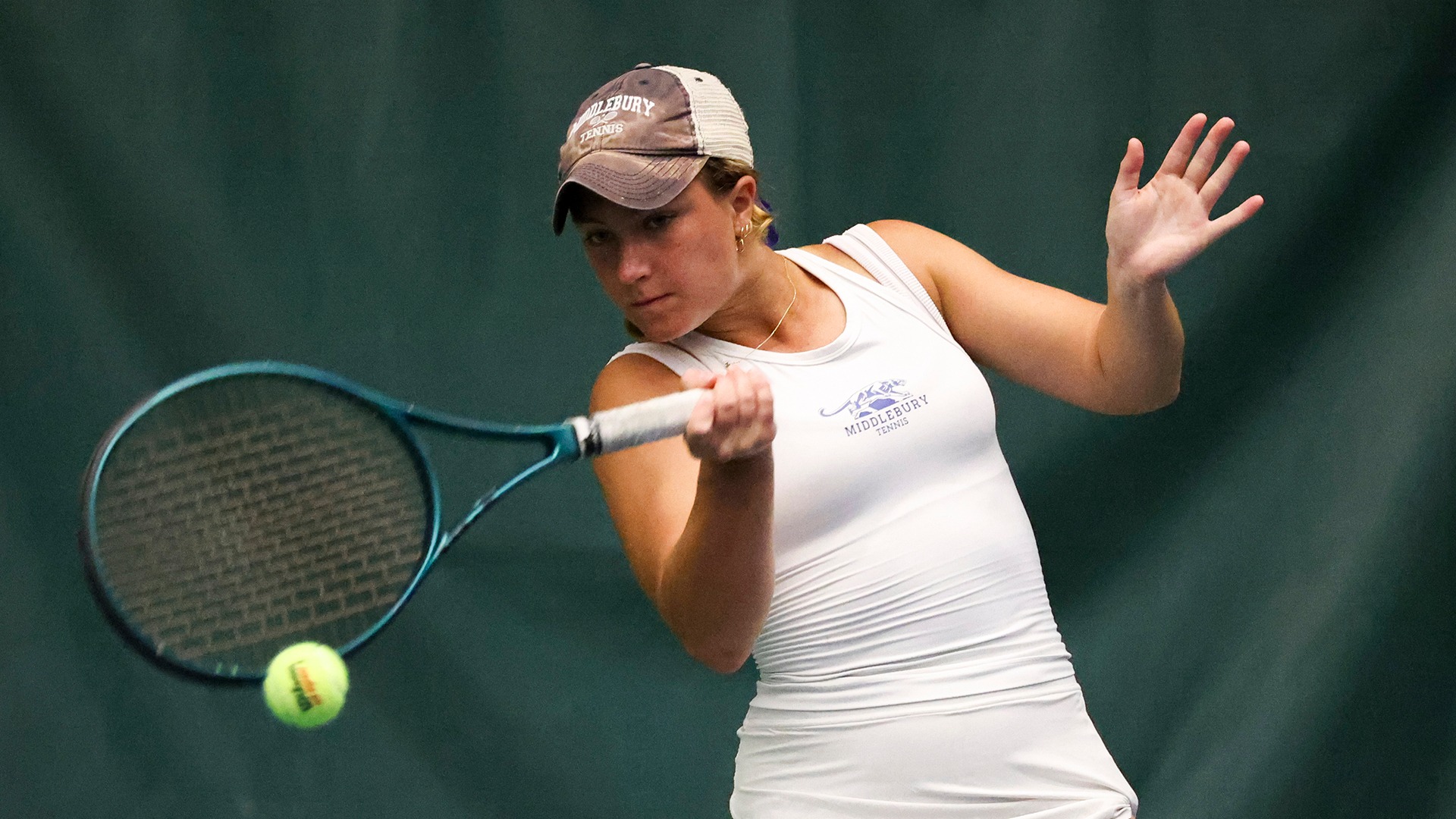 Elizabeth Doak returns a ball during Middlebury's match against Hamilton