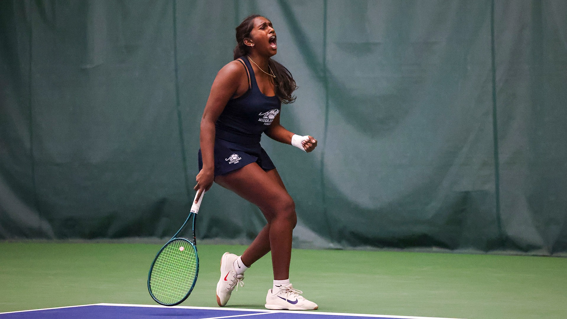 Diya Pachamuthu celebrates after winning a point during doubles action against Tufts in the second round of the 2026 NCAA Tournament.