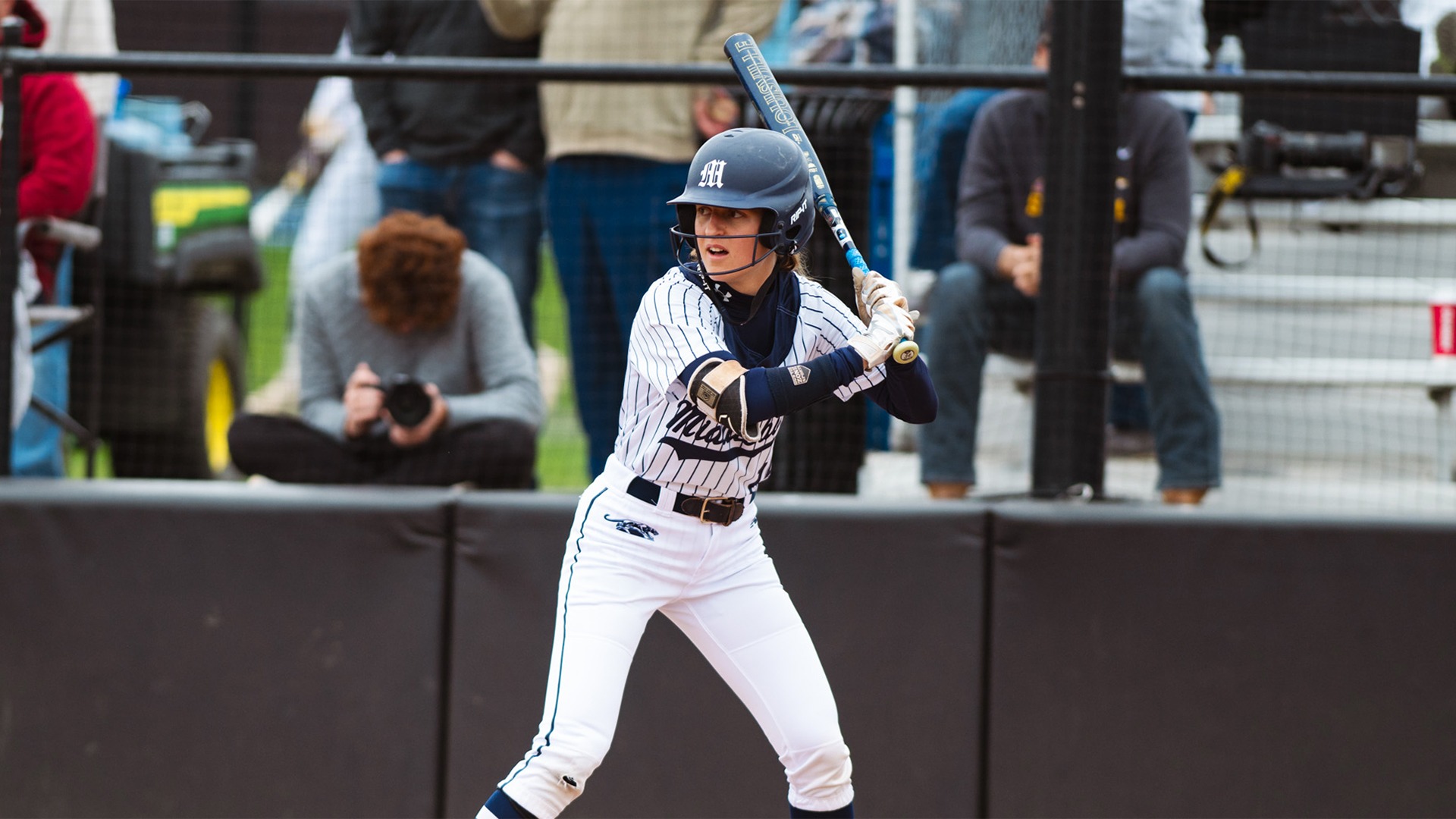 Kristyn Carroll readies for a pitch in the batters box during Middlebury's game against Alfred in the NCAA Regionals.