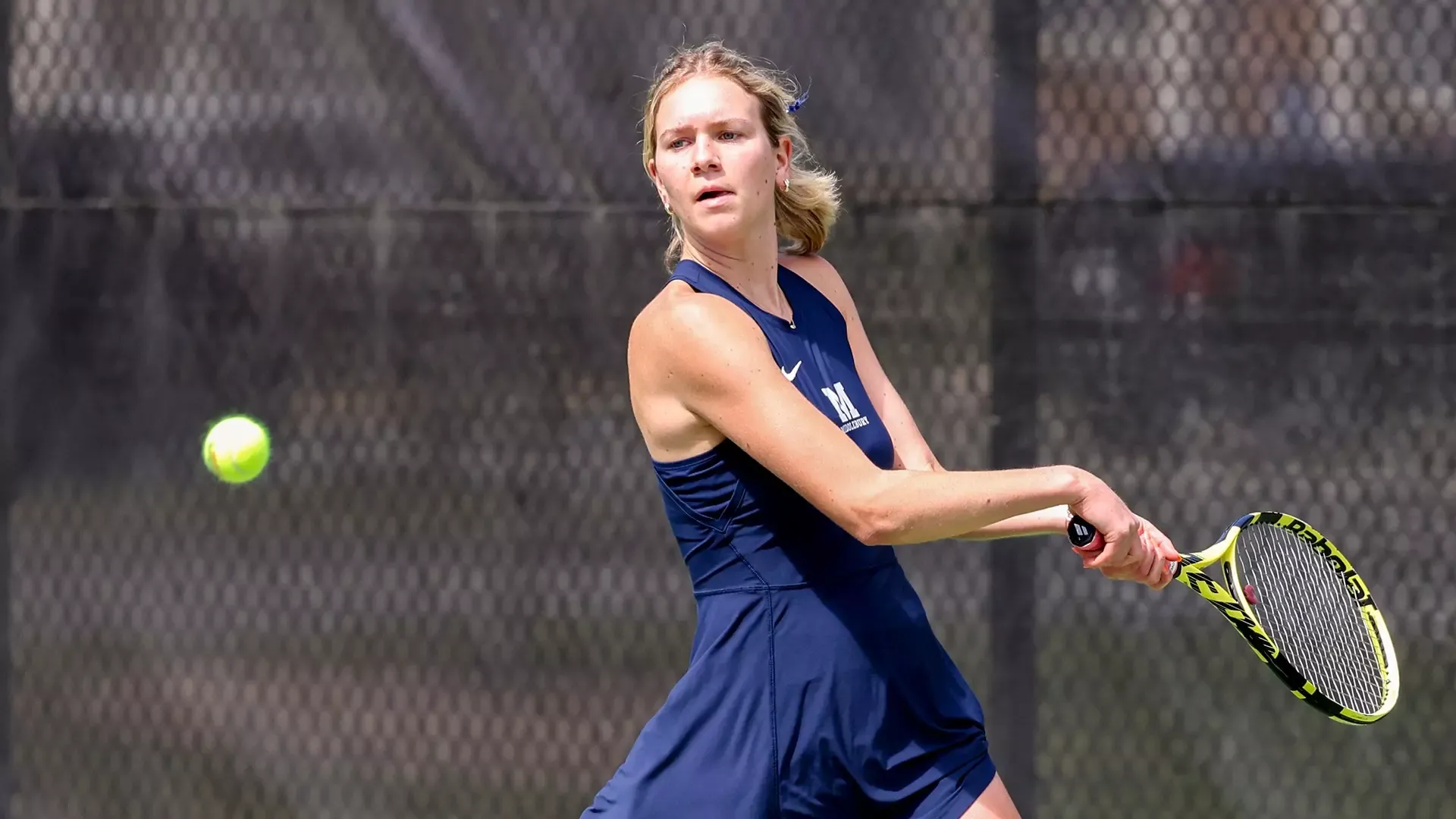 Elsie Van Wieren readies to return a shot during Middlebury's match against Williams.