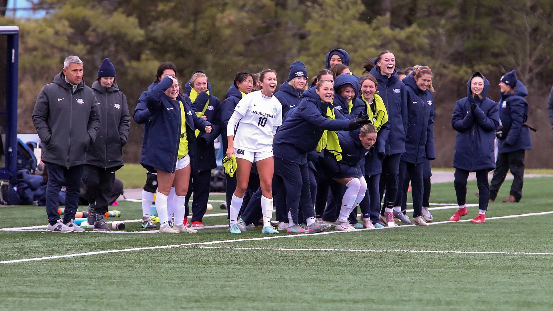 A celebration photo of the Middlebury women's soccer team.