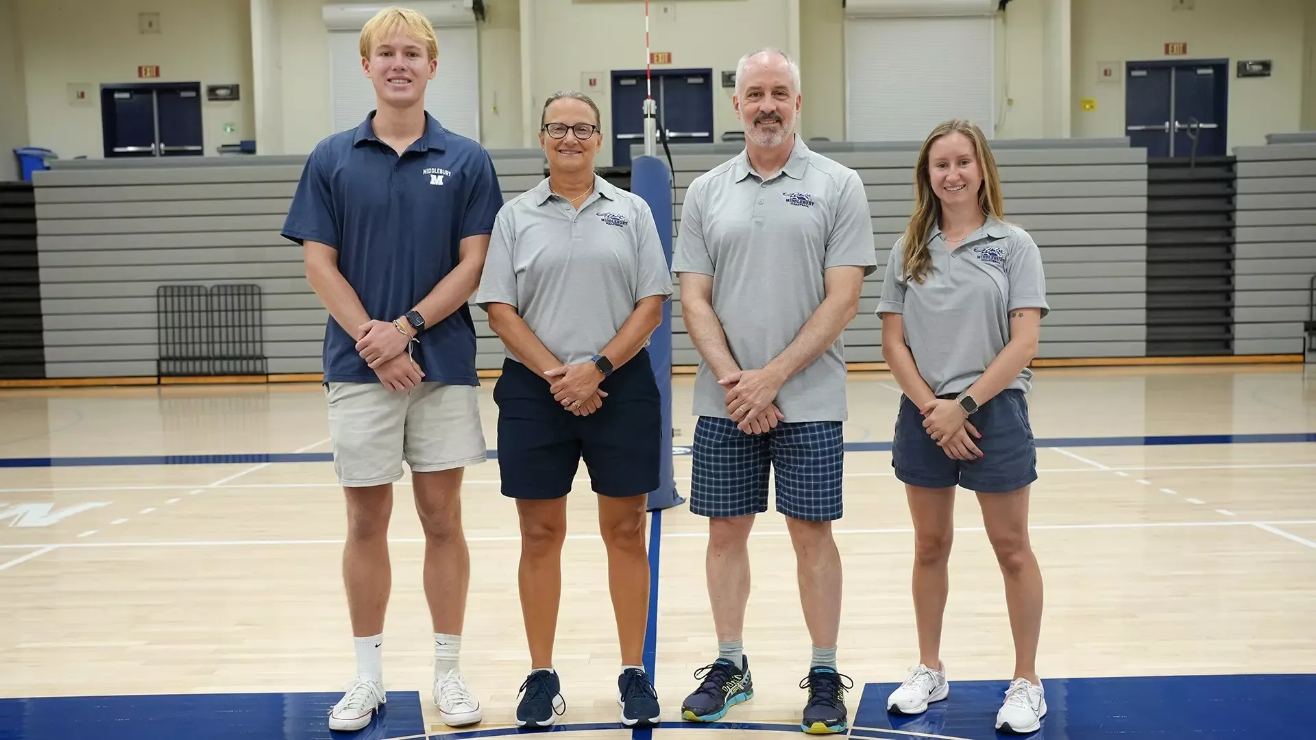 A photo of the 2026 Middlebury volleyball coaching staff.