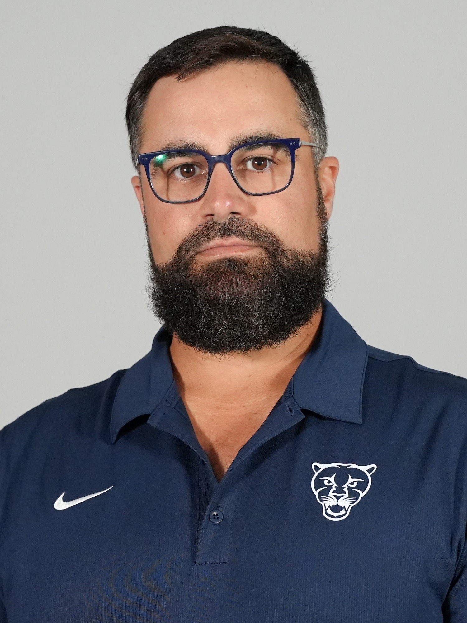 A headshot of Middlebury football coach Anthony Marsella.