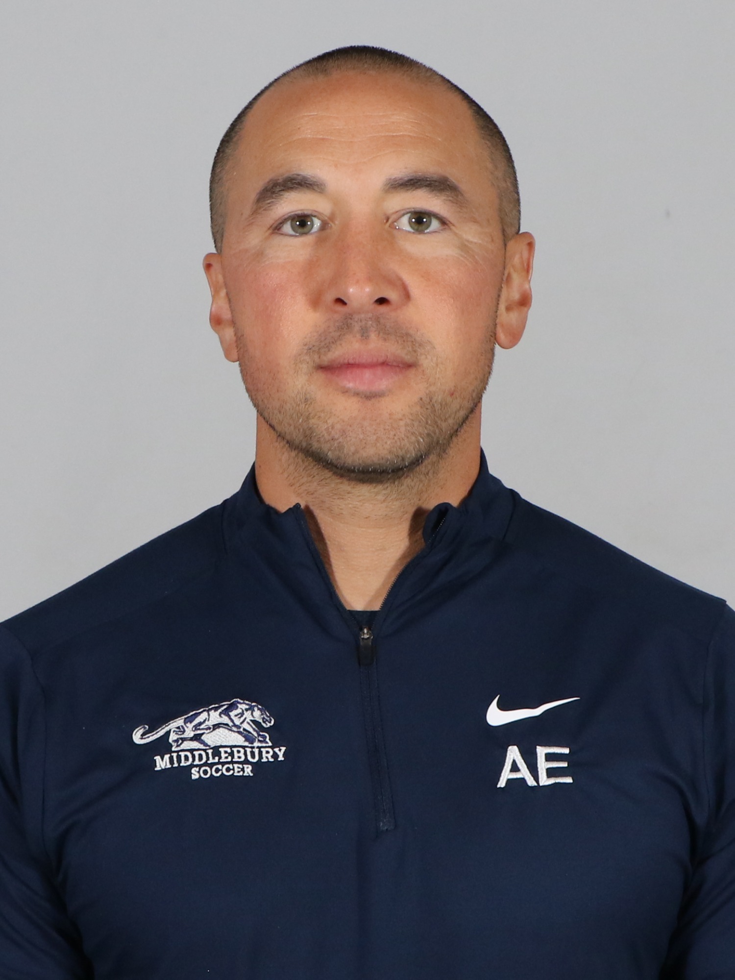 A headshot of head Middlebury men's soccer coach Alex Elias.