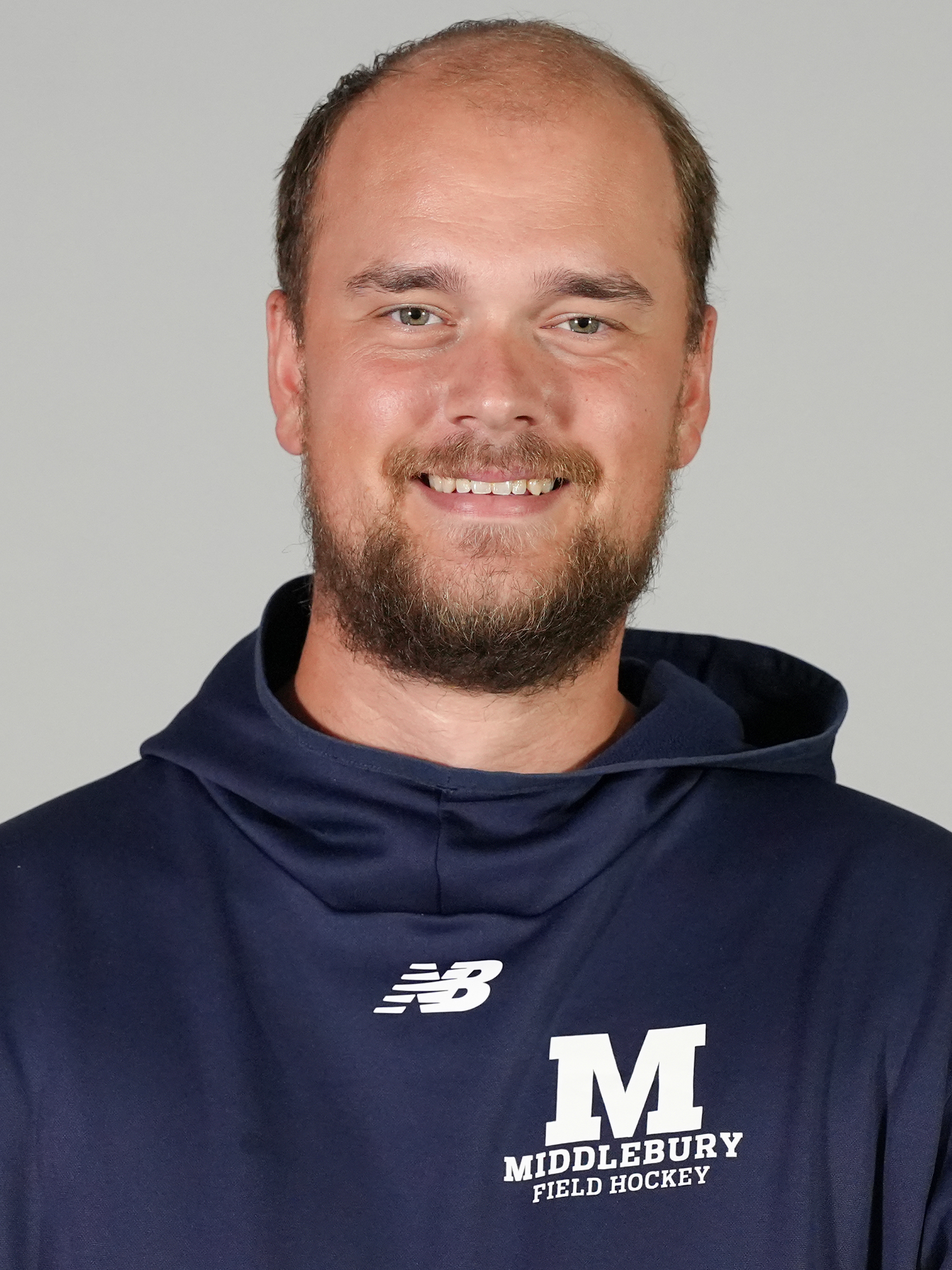 Coach Noah den Hartog's 2026 headshot.