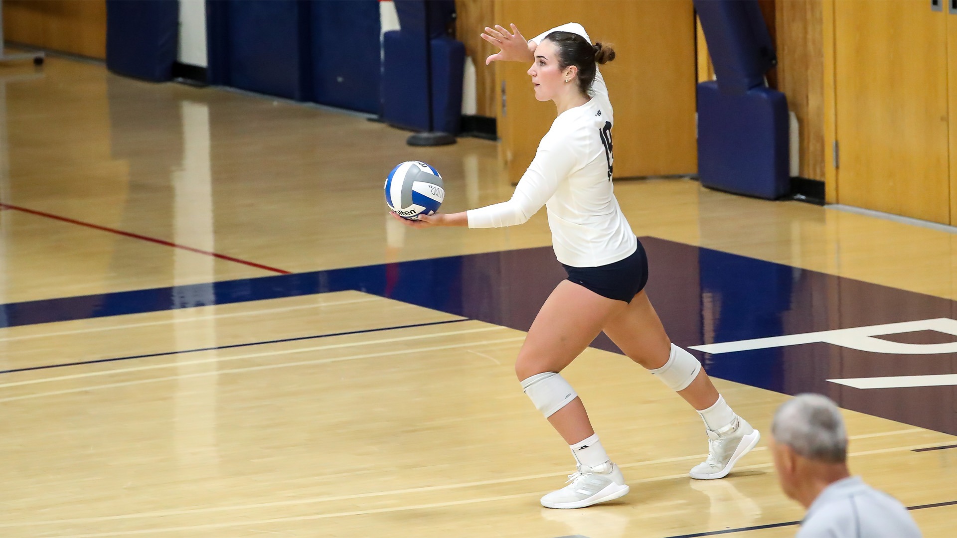 Caroline Byrne dials up a serve against St. Michael's.