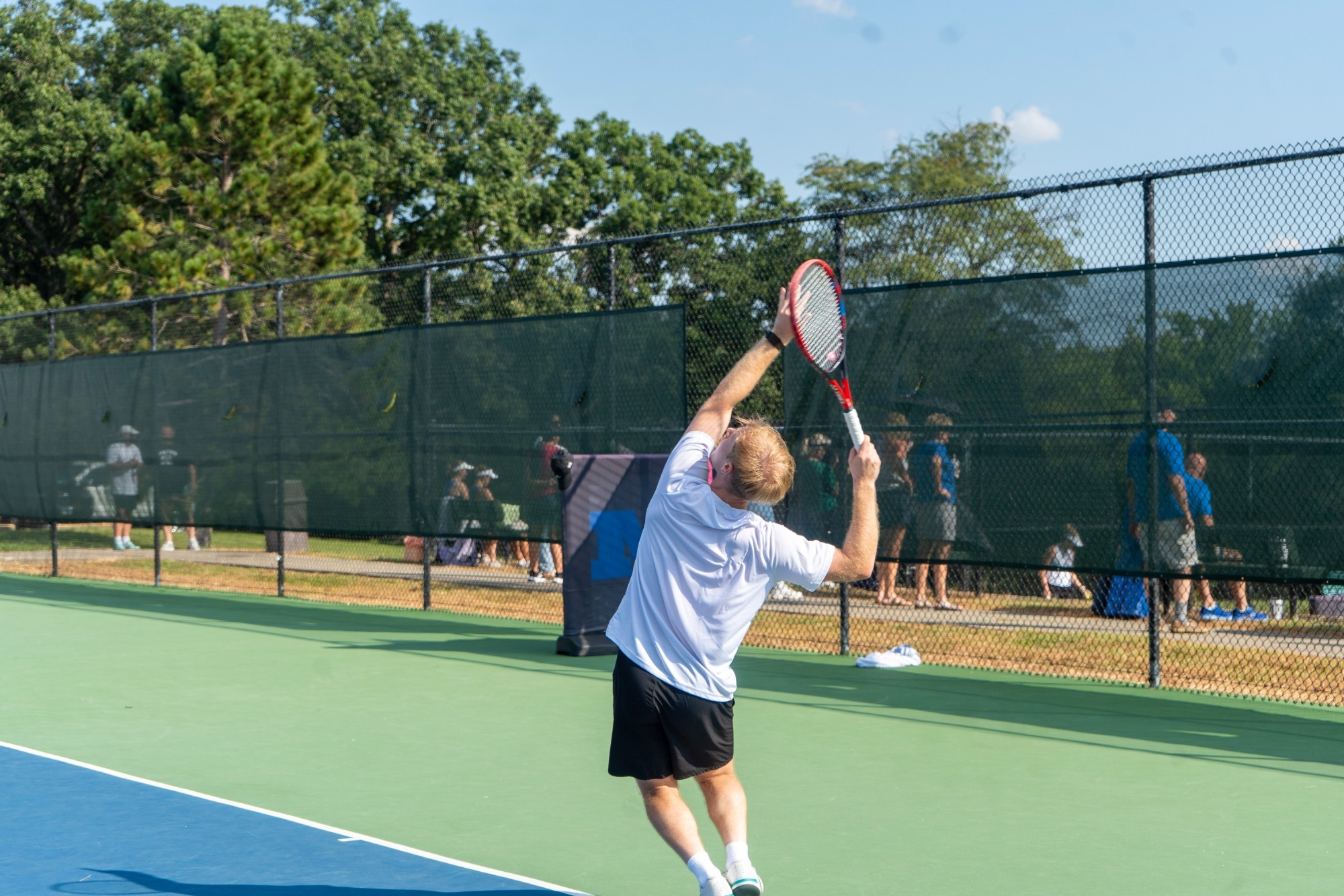 Colin Klein serves vs IC