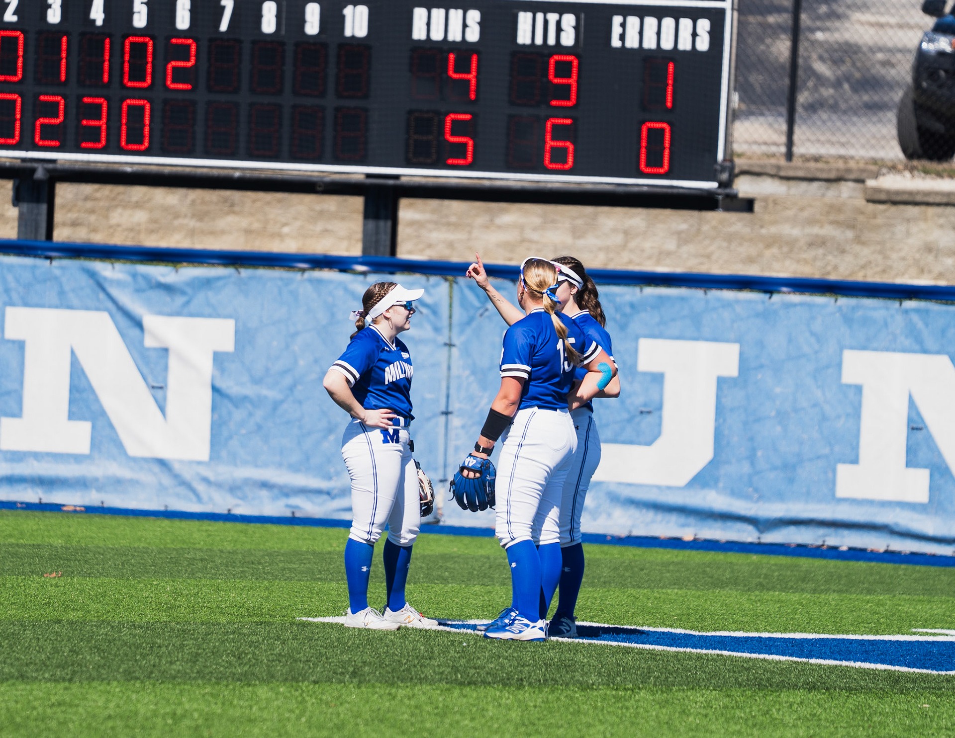 outfield huddle softball