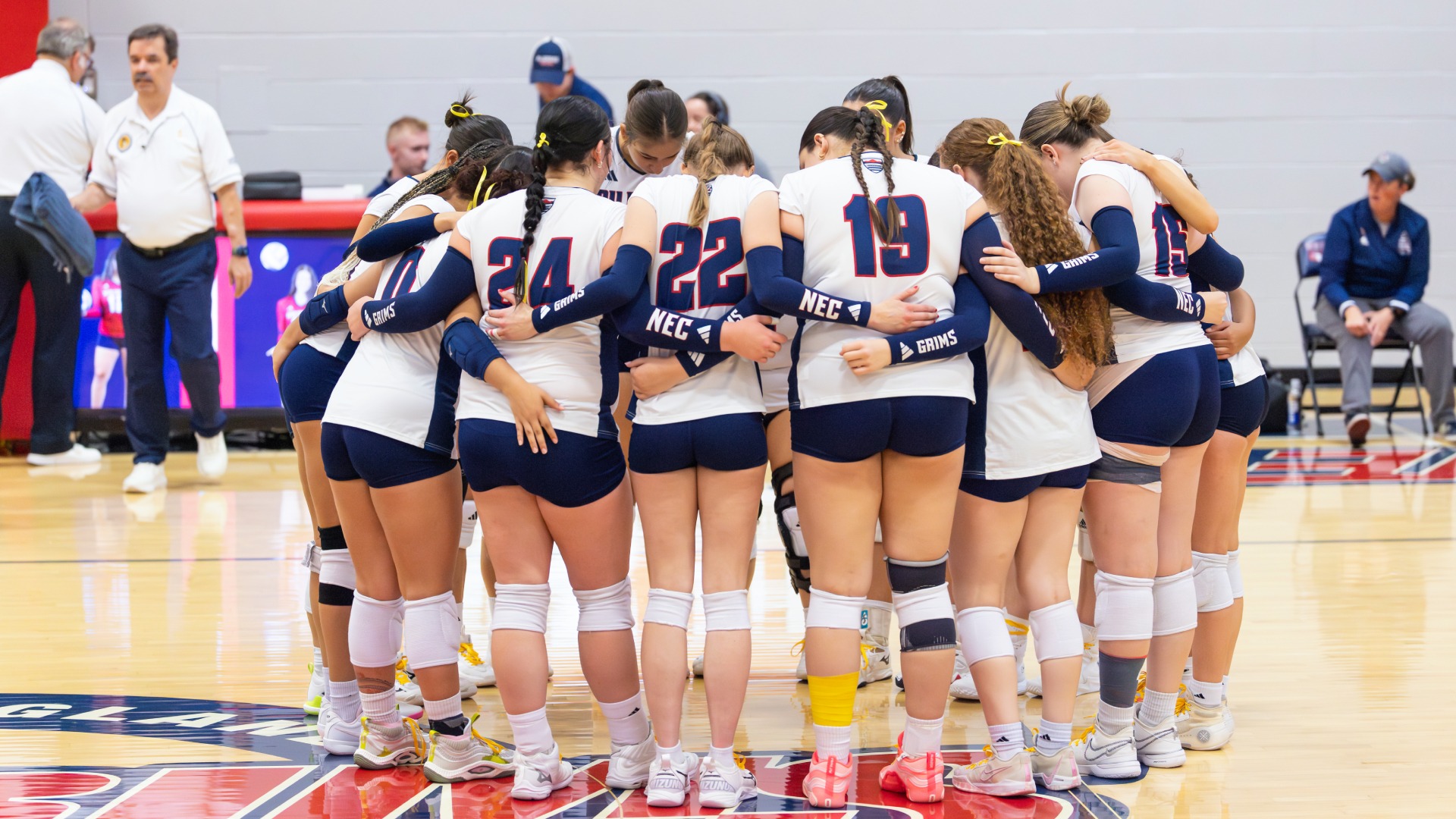 Women's Volleyball Team Huddle