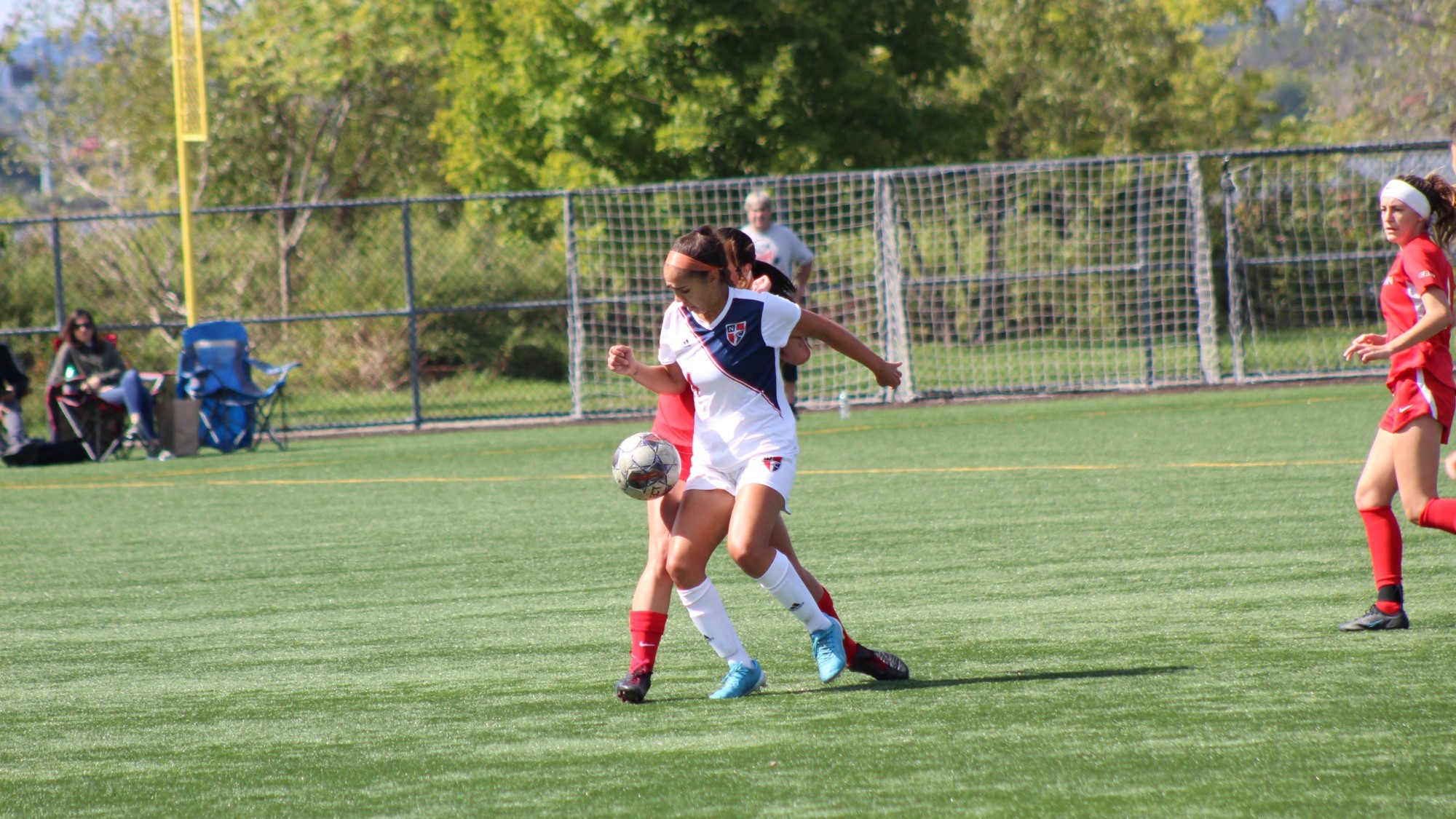 Haile Velarde screening the ball