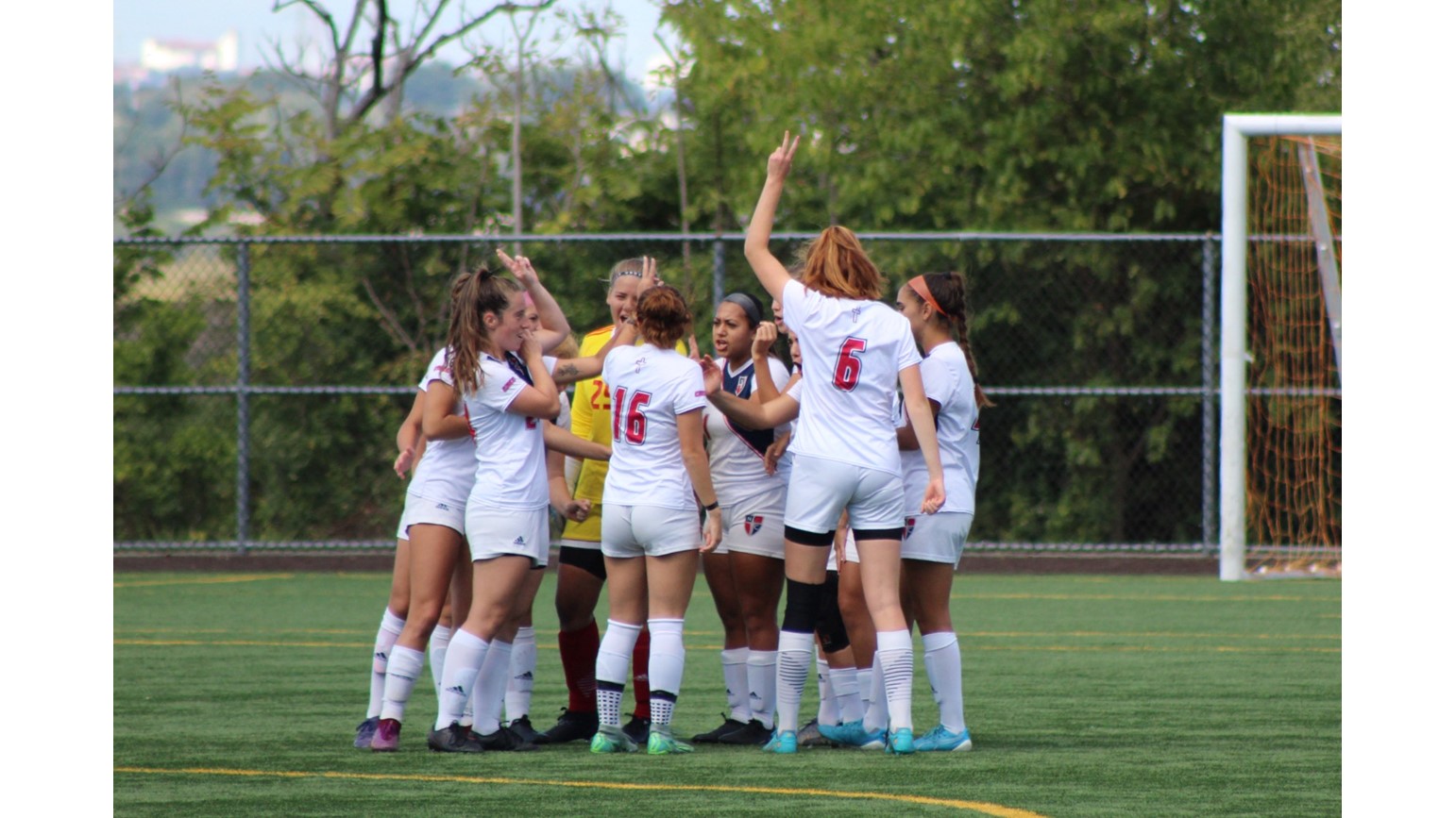 Women's Soccer Team Huddle before Game