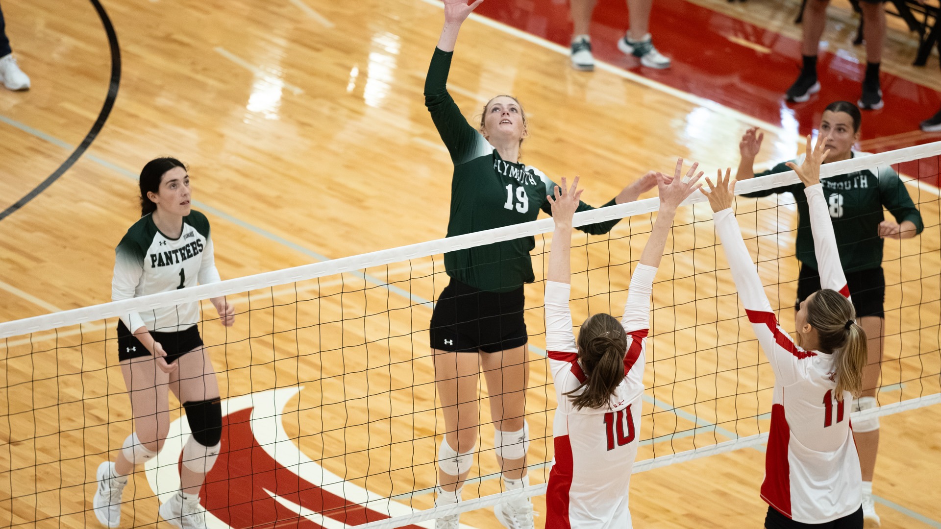 Sydney Riley goes up for the kill against WPI