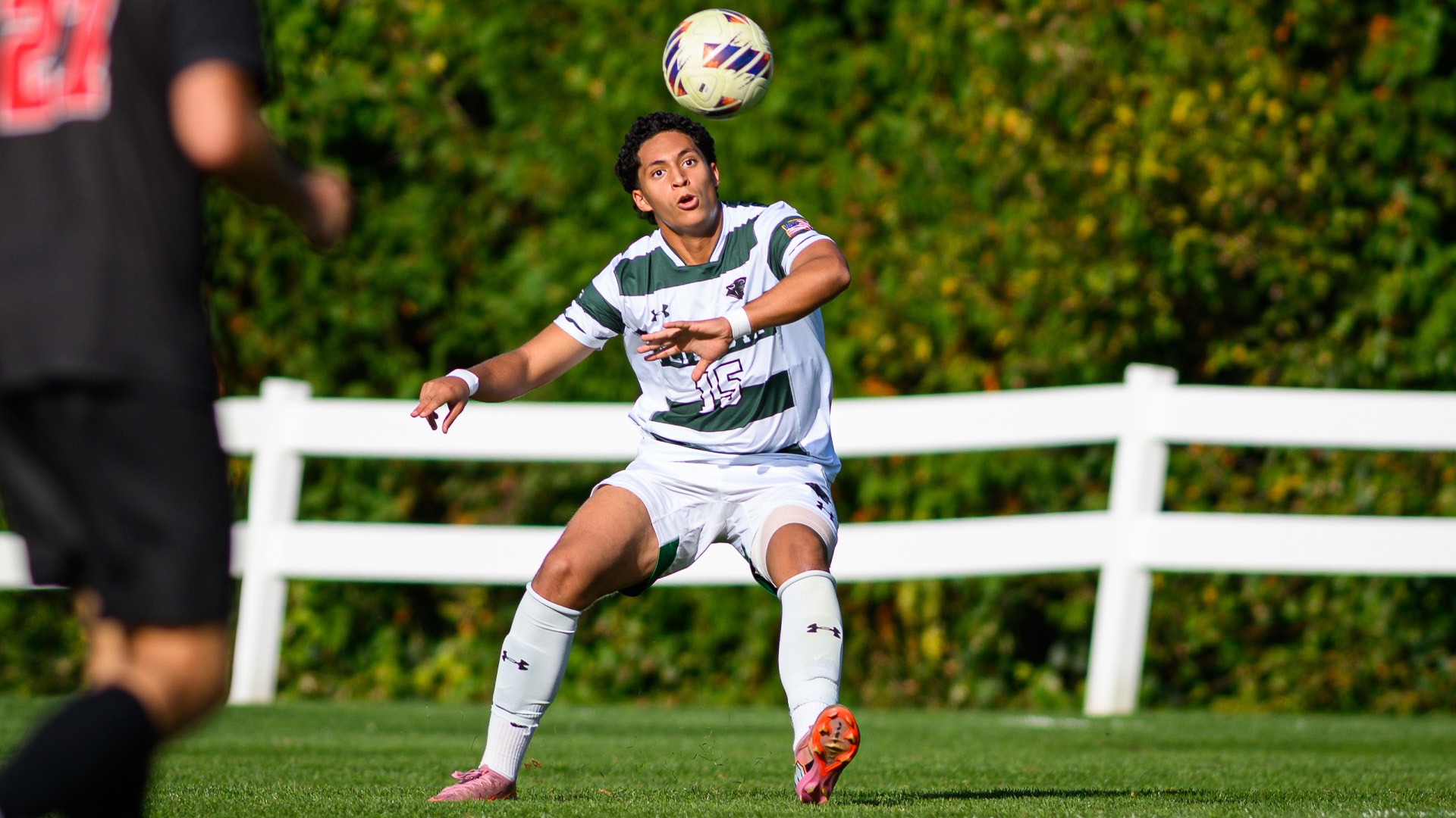 Mohammed Ayari heads down a ball against Keene State