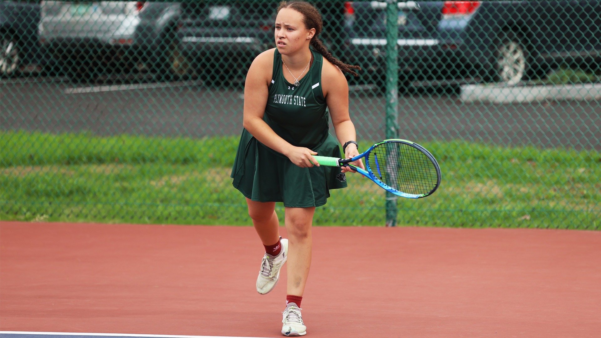Anyah Fields fires a serve in recent play