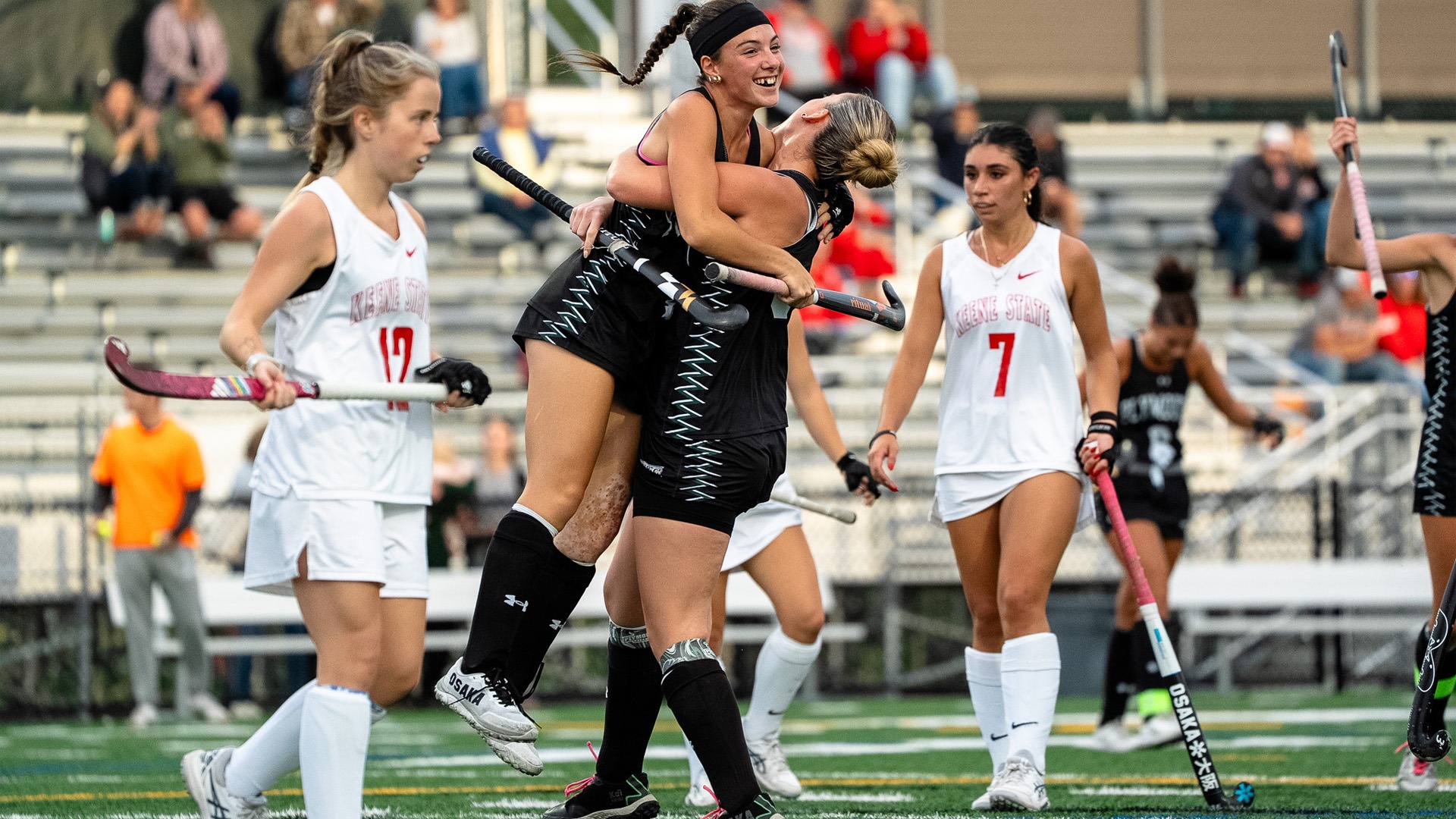 Amelia Avery and Lexi Berrettini celebrate a goal against Keene State
