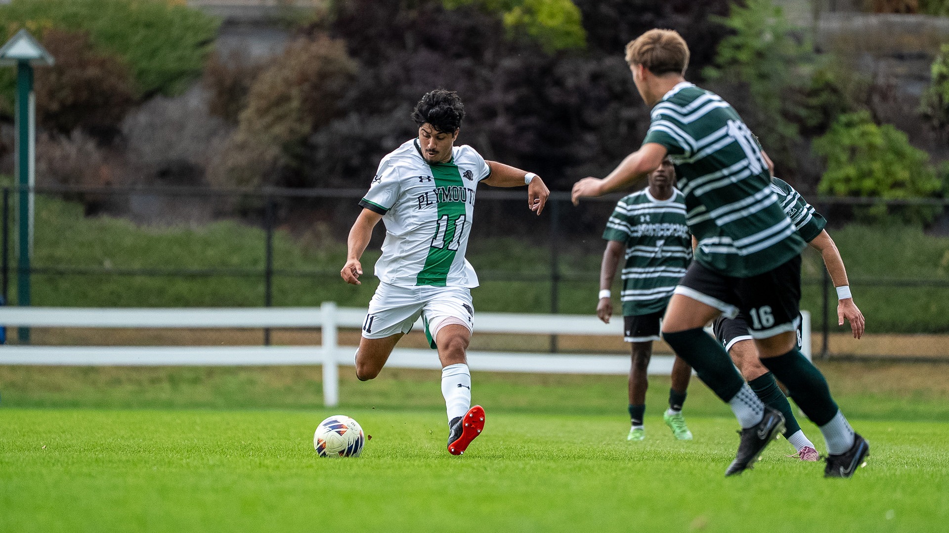Vince Cassarino clears a ball in a match against VTSU Castleton