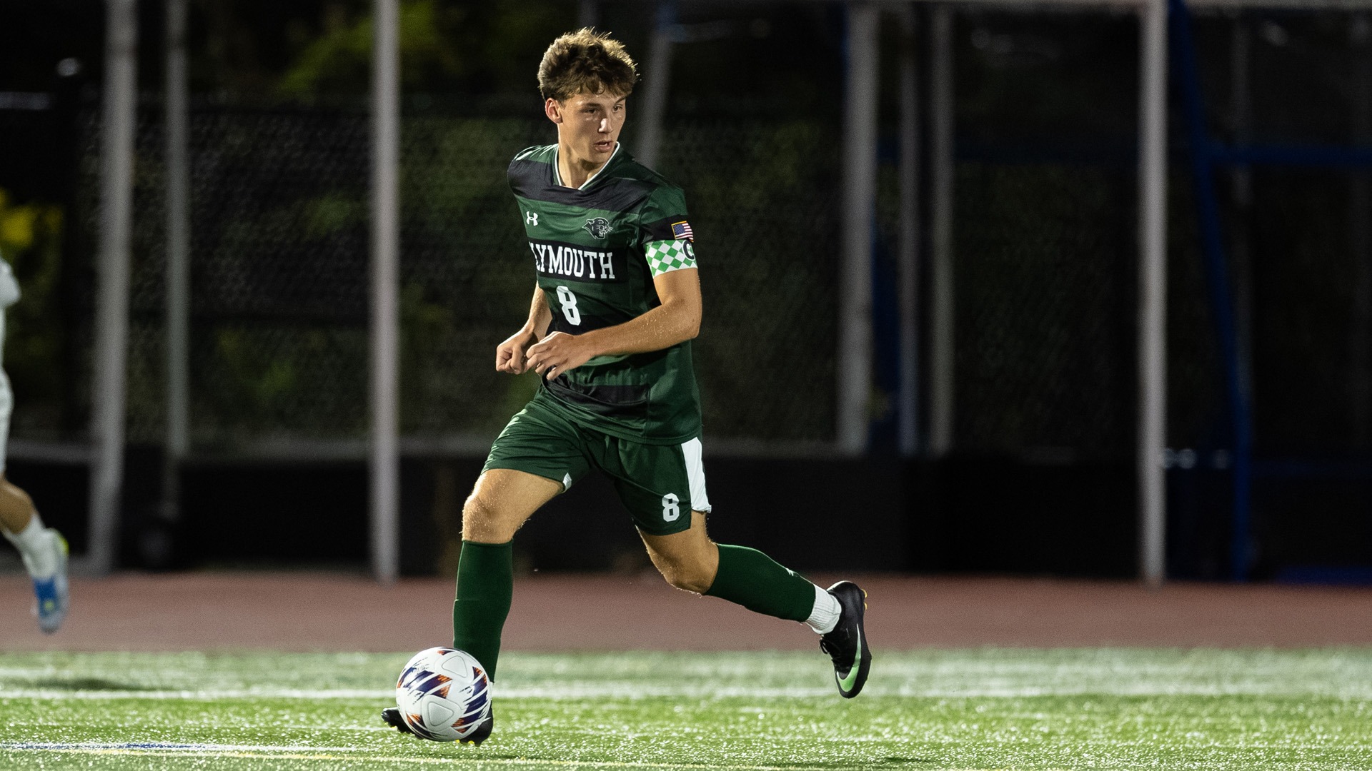 Nick Ferro looks for an opening at Worcester State