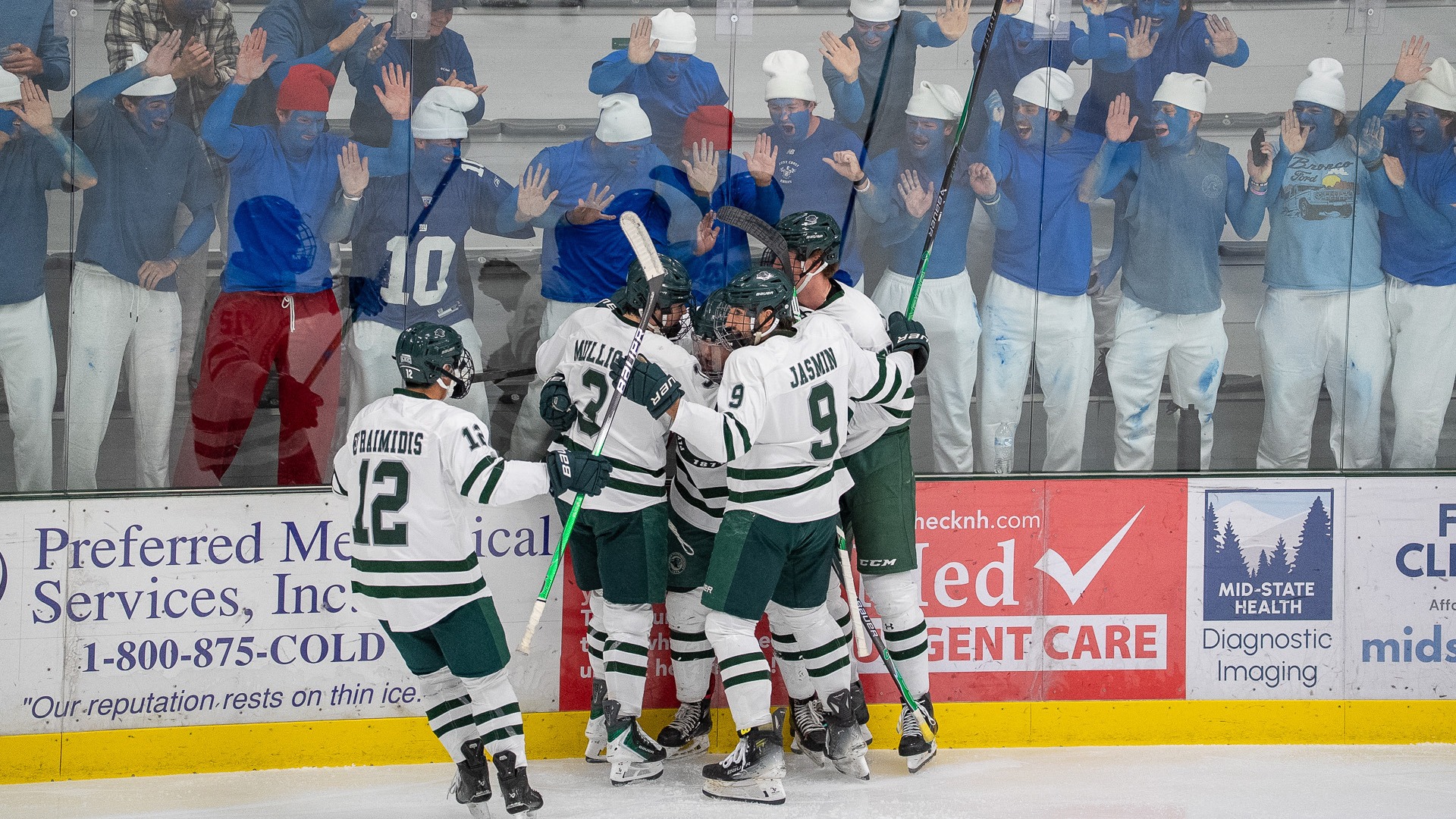 PSU men's hockey players celebrate a goal in front of the home crowd against Curry