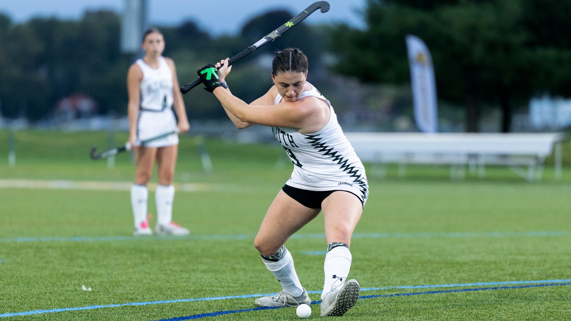 Sarah Adamske prepares to drive a ball at Johnson & Wales