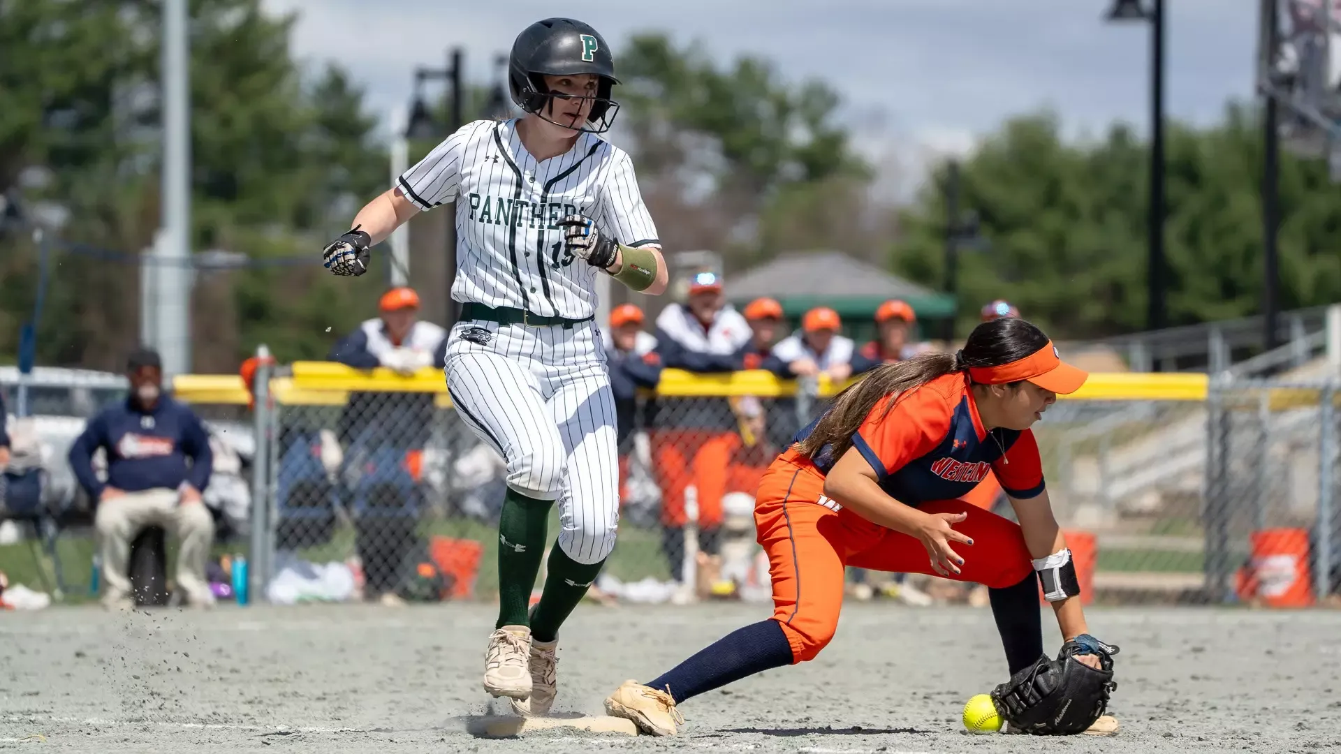 Emily Bessette beats out an infield hit against WestConn