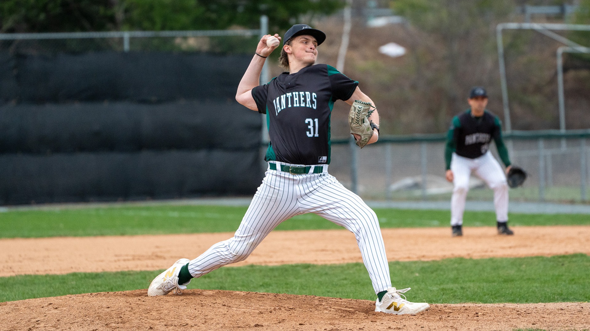 Cash Alexander delivers a pitch against Gordon